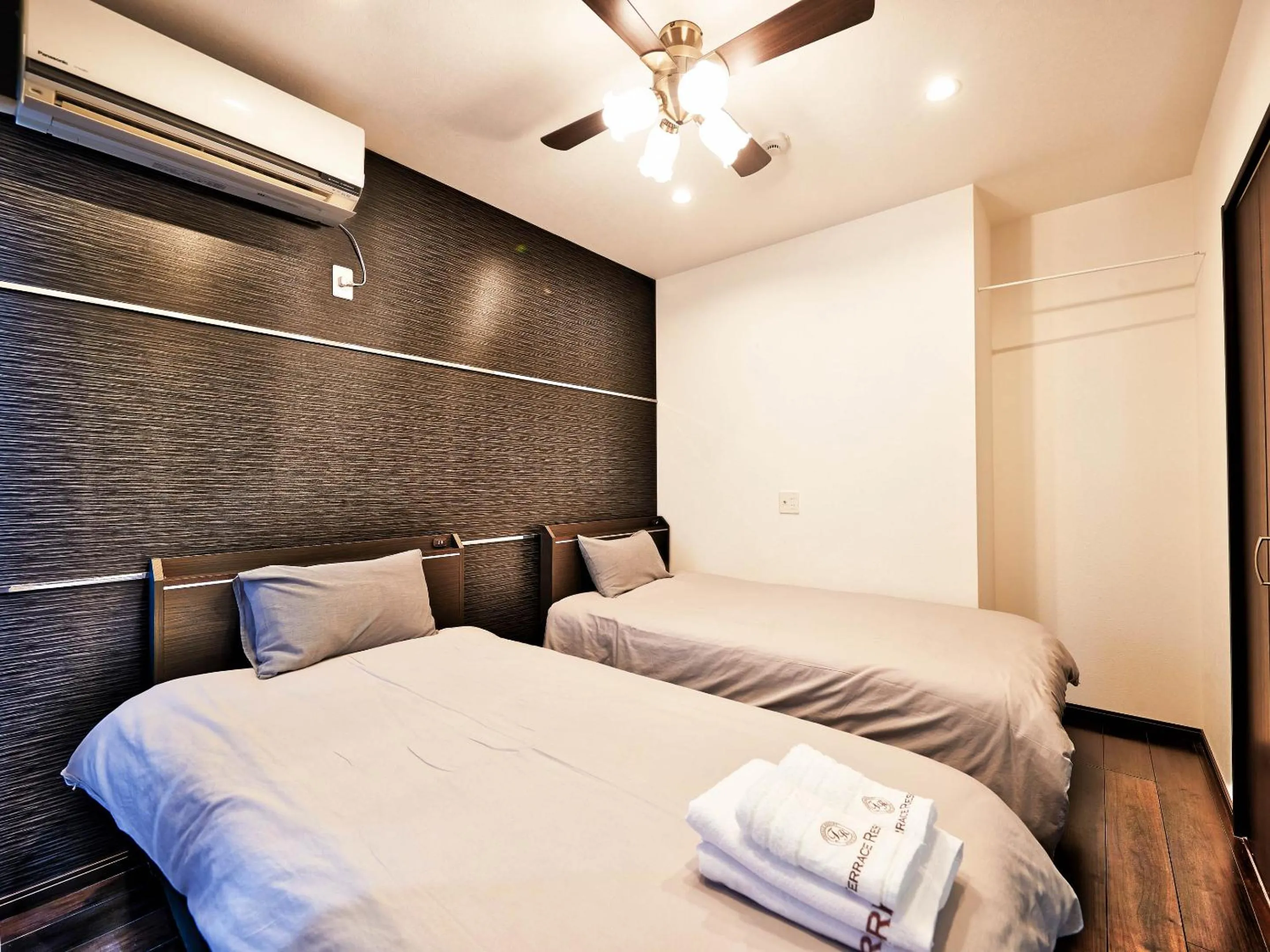 Bed in Terrace Resort Shintoshin