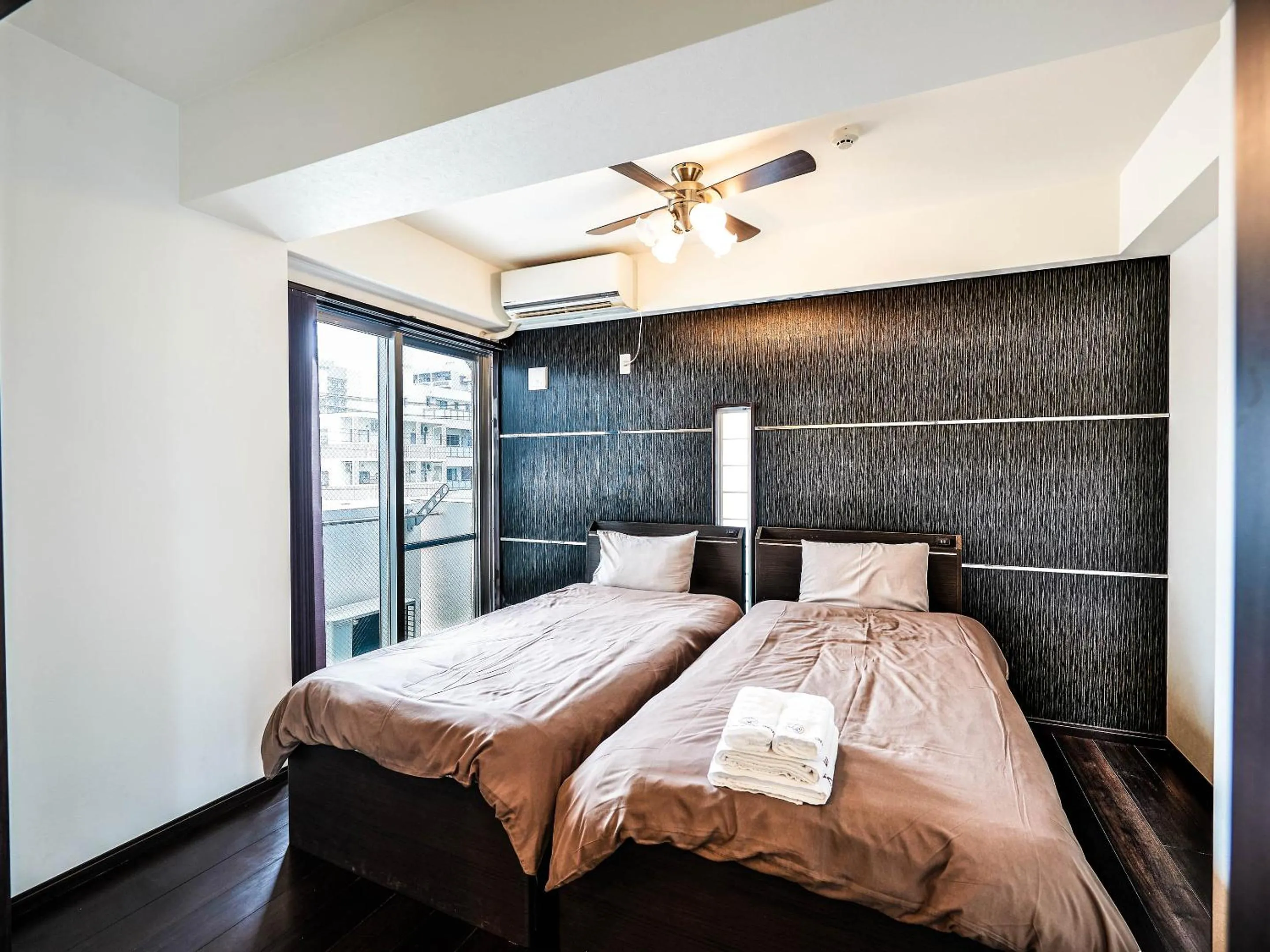 Bed in Terrace Resort Shintoshin