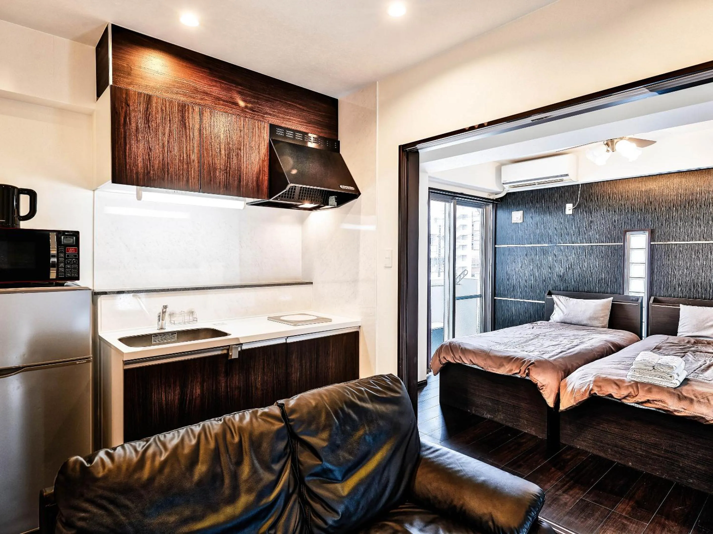 Living room, Bed in Terrace Resort Shintoshin