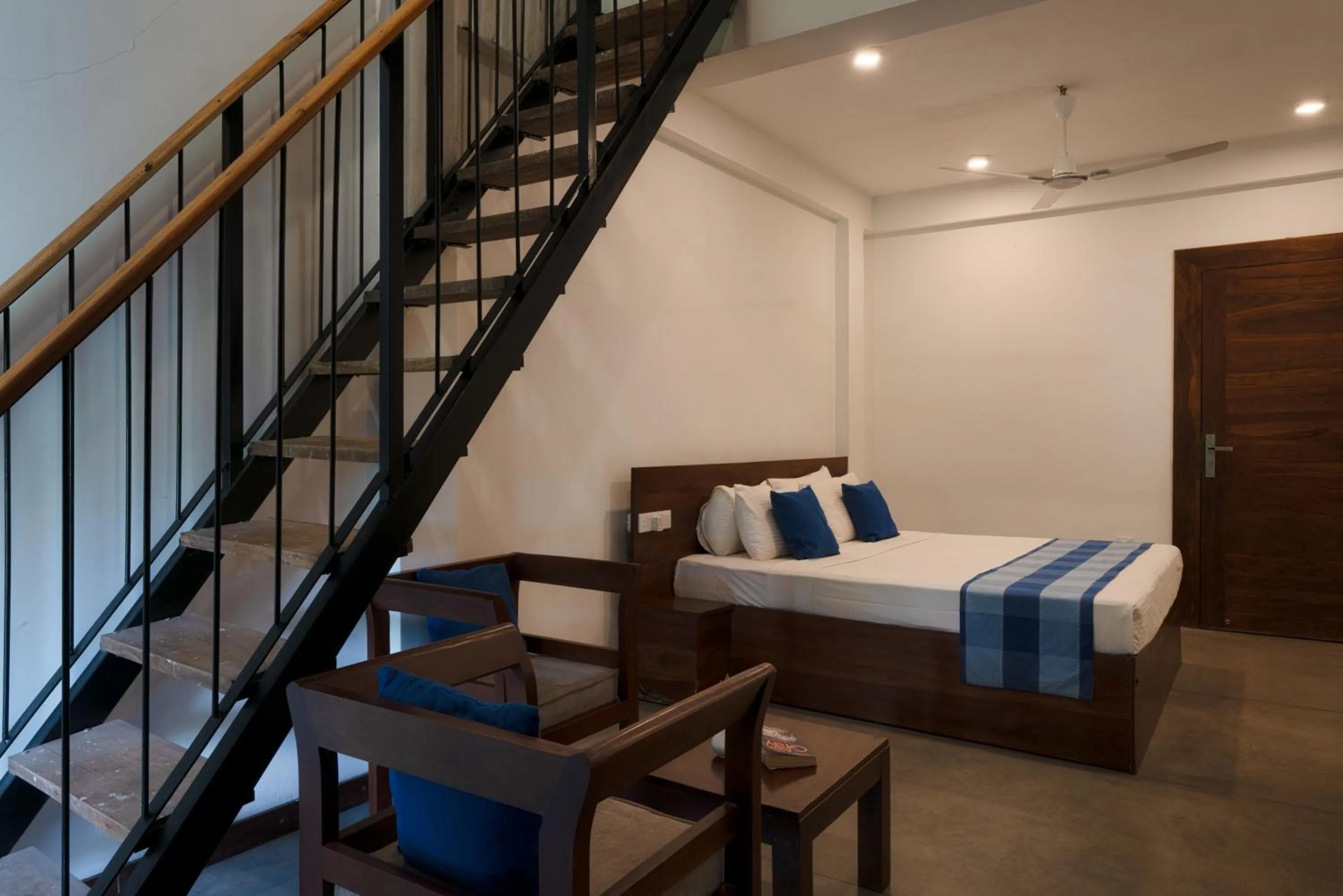 Living room, Bed in Lario Resort Sigiriya