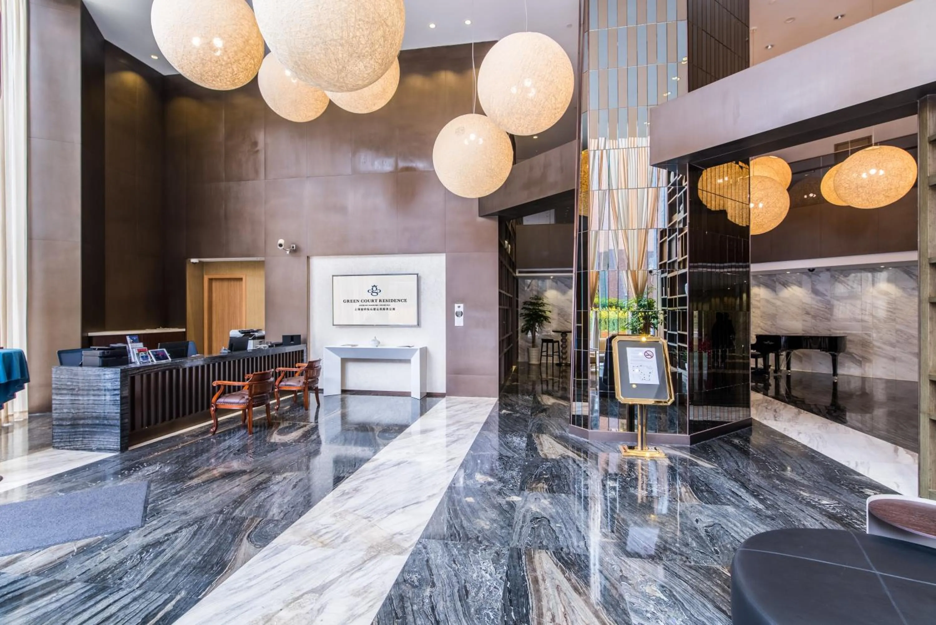 Lobby or reception in Green Court Residence Jinqiao Diamond Shanghai