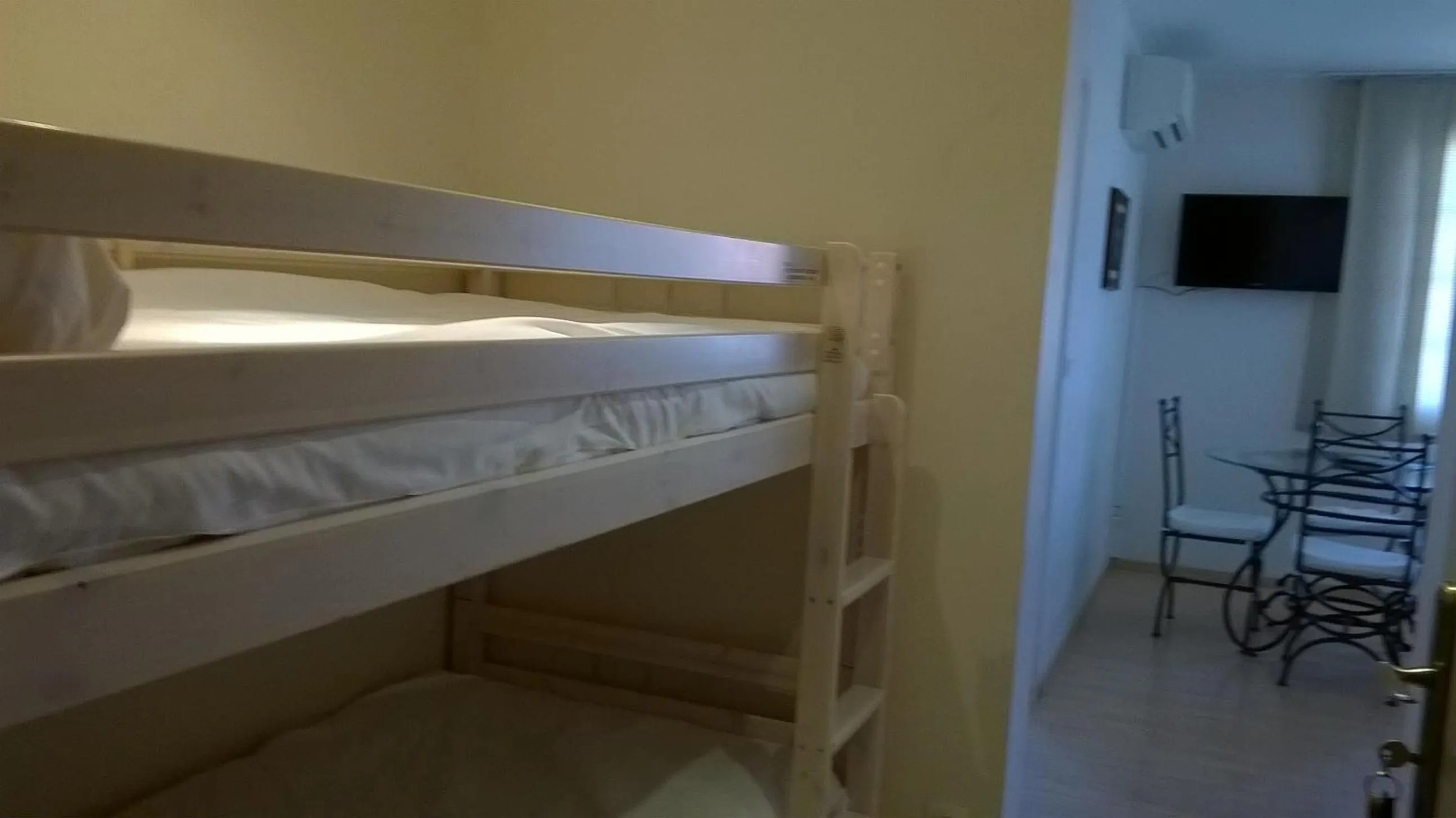 Bed in Hôtel Résidence Bergara