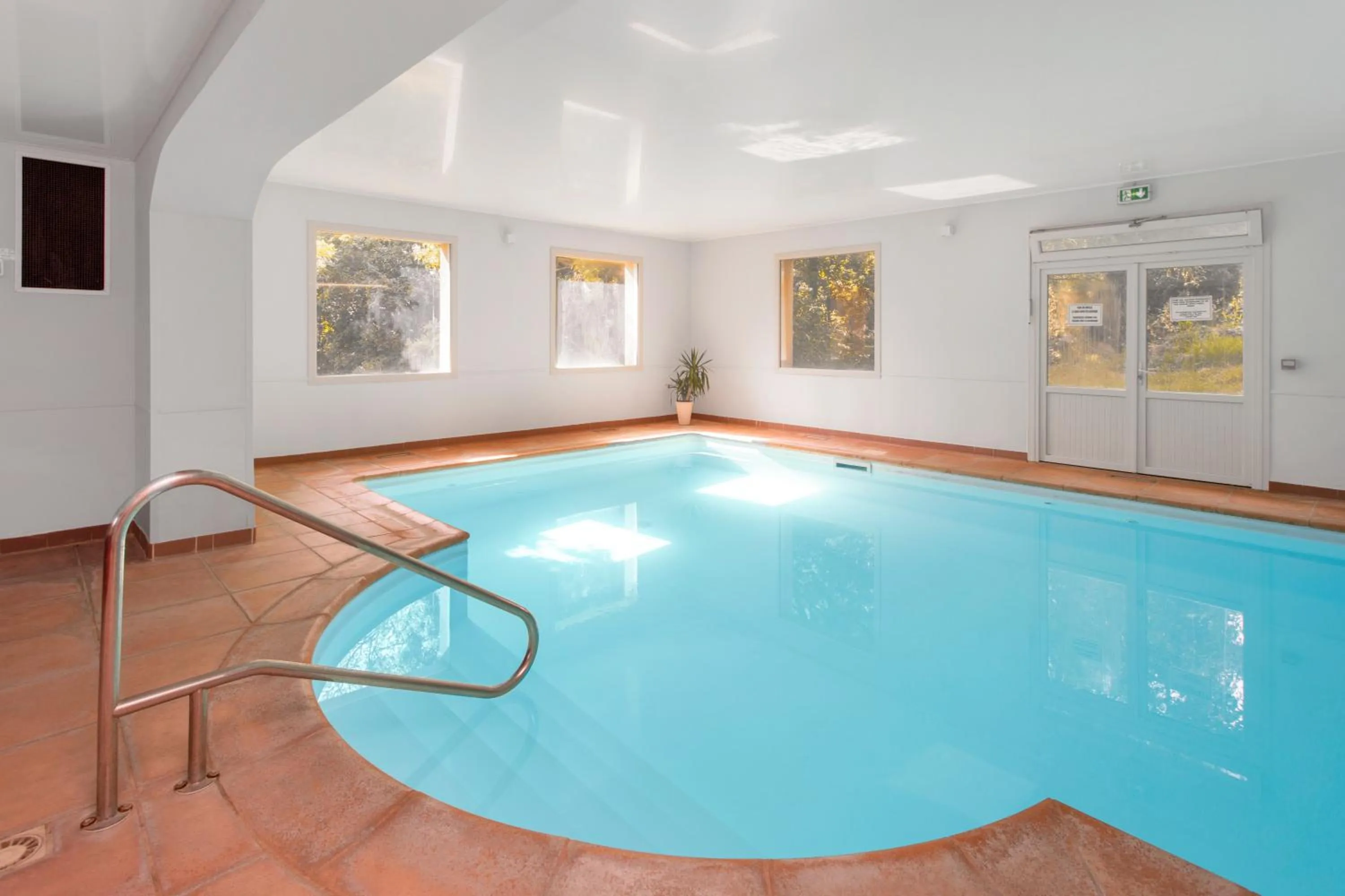 Swimming pool in Hôtel Le Romantica