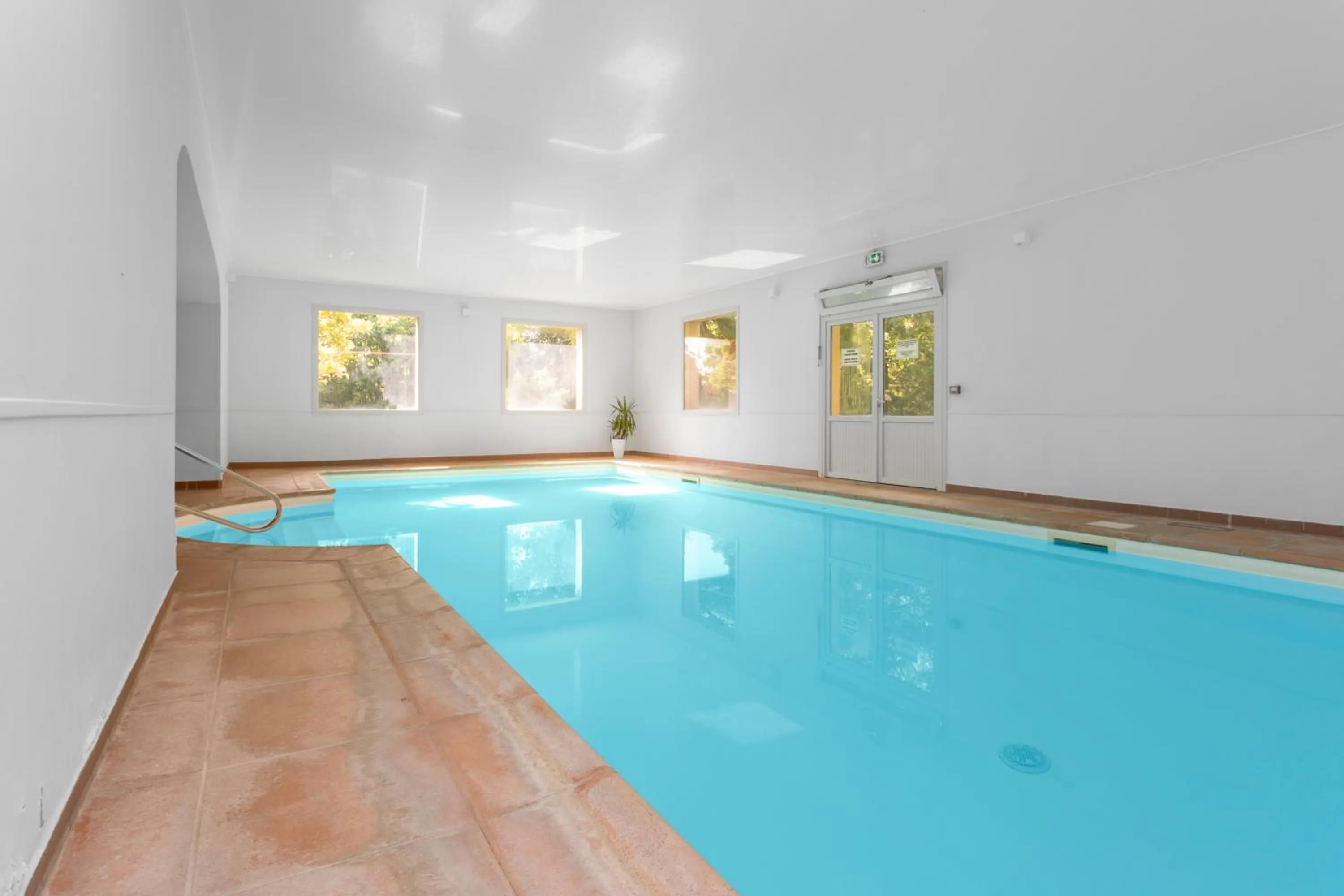 Swimming pool in Hôtel Le Romantica