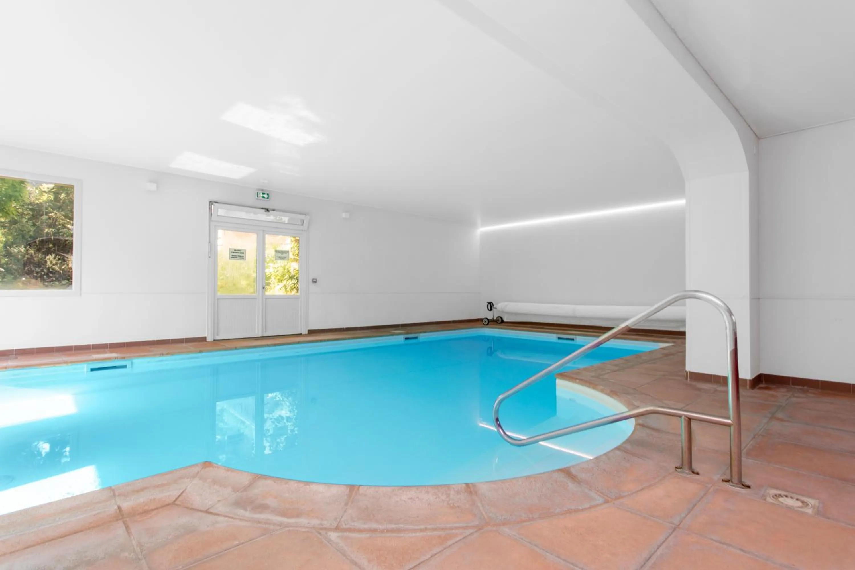 Swimming pool in Hôtel Le Romantica