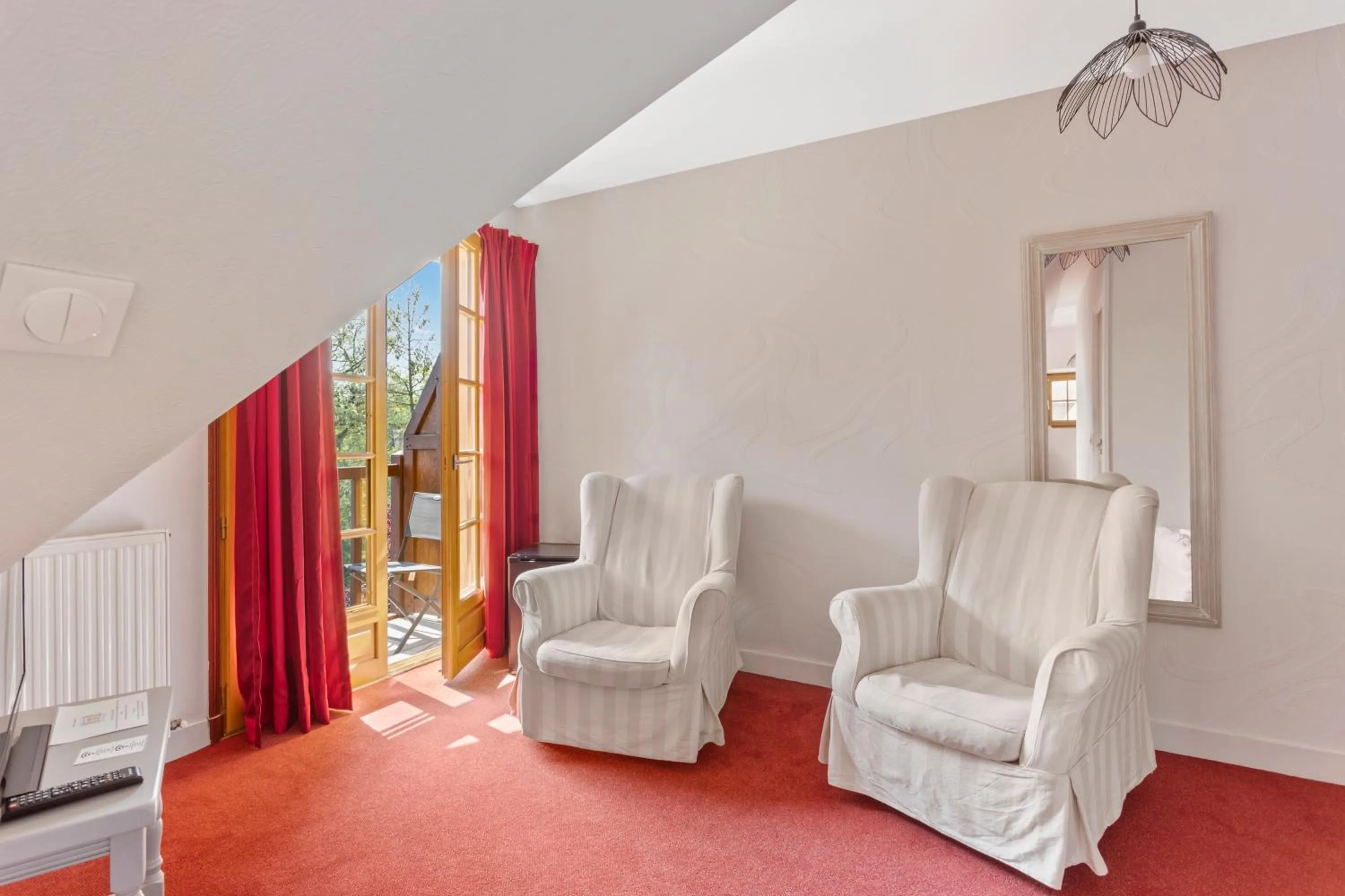 Seating area in Hôtel Le Romantica
