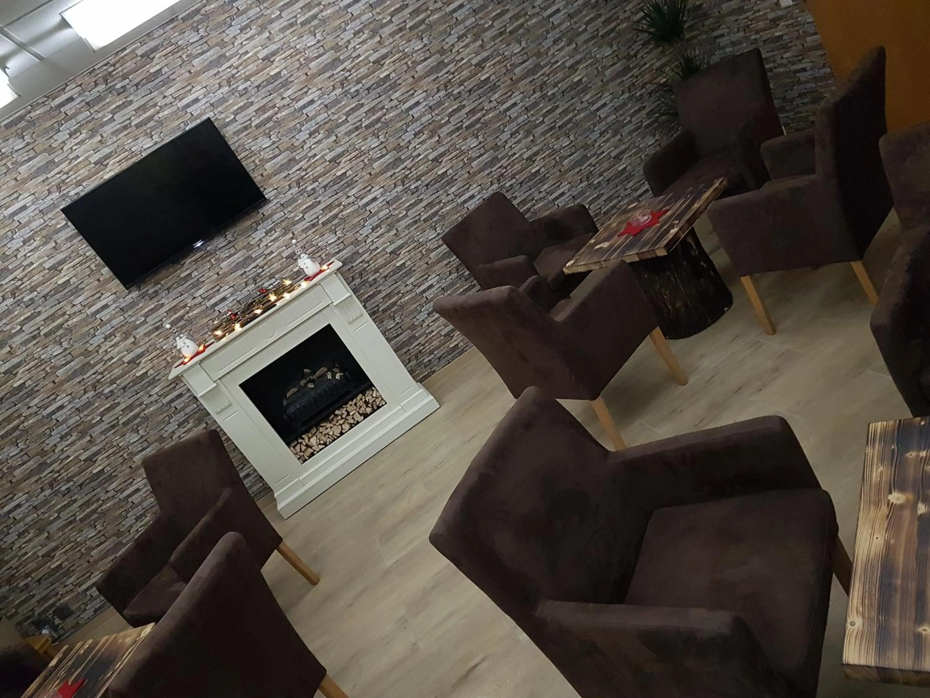 Communal lounge/ TV room in Hotel A2