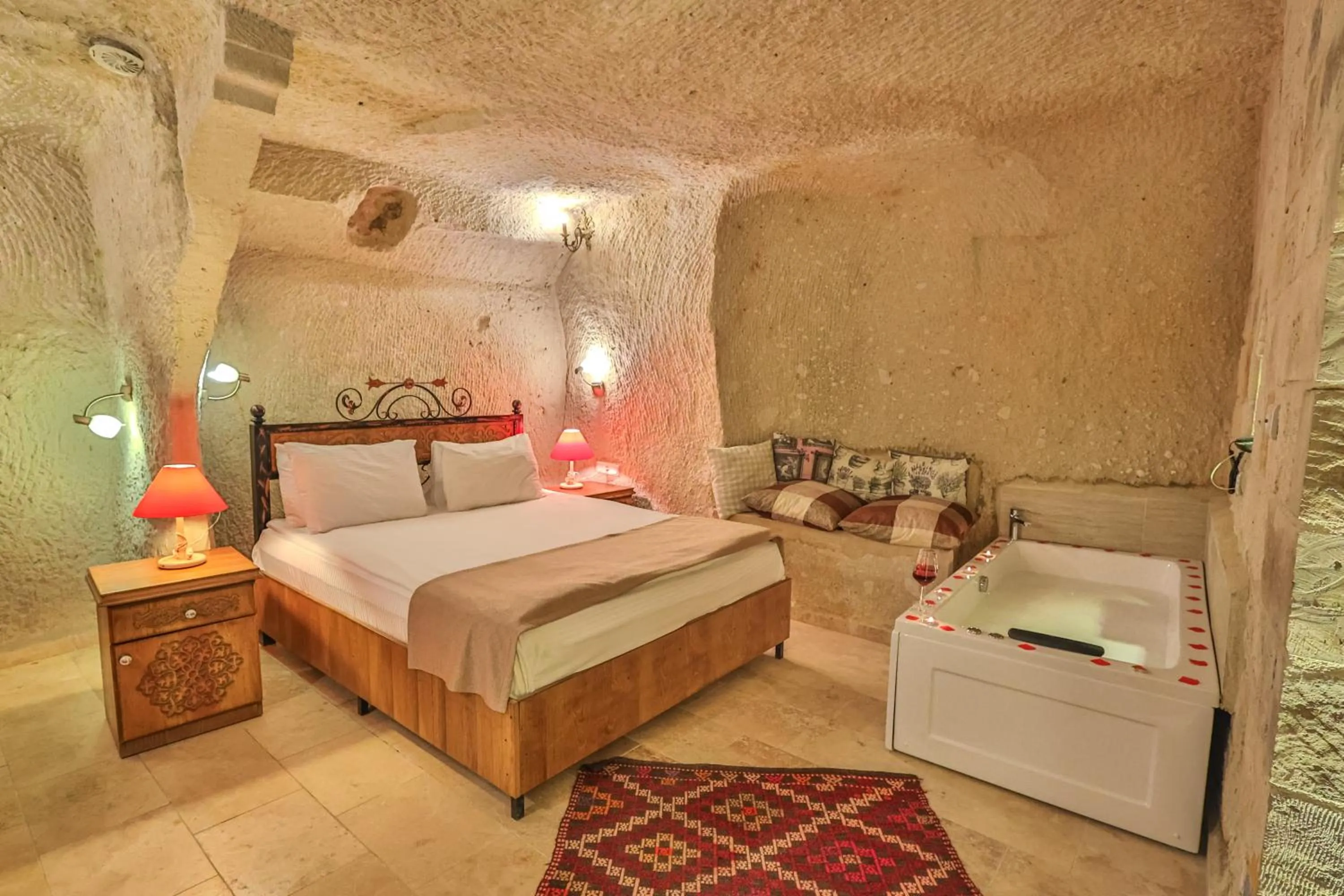 Bed in Bedrock Cave Hotel