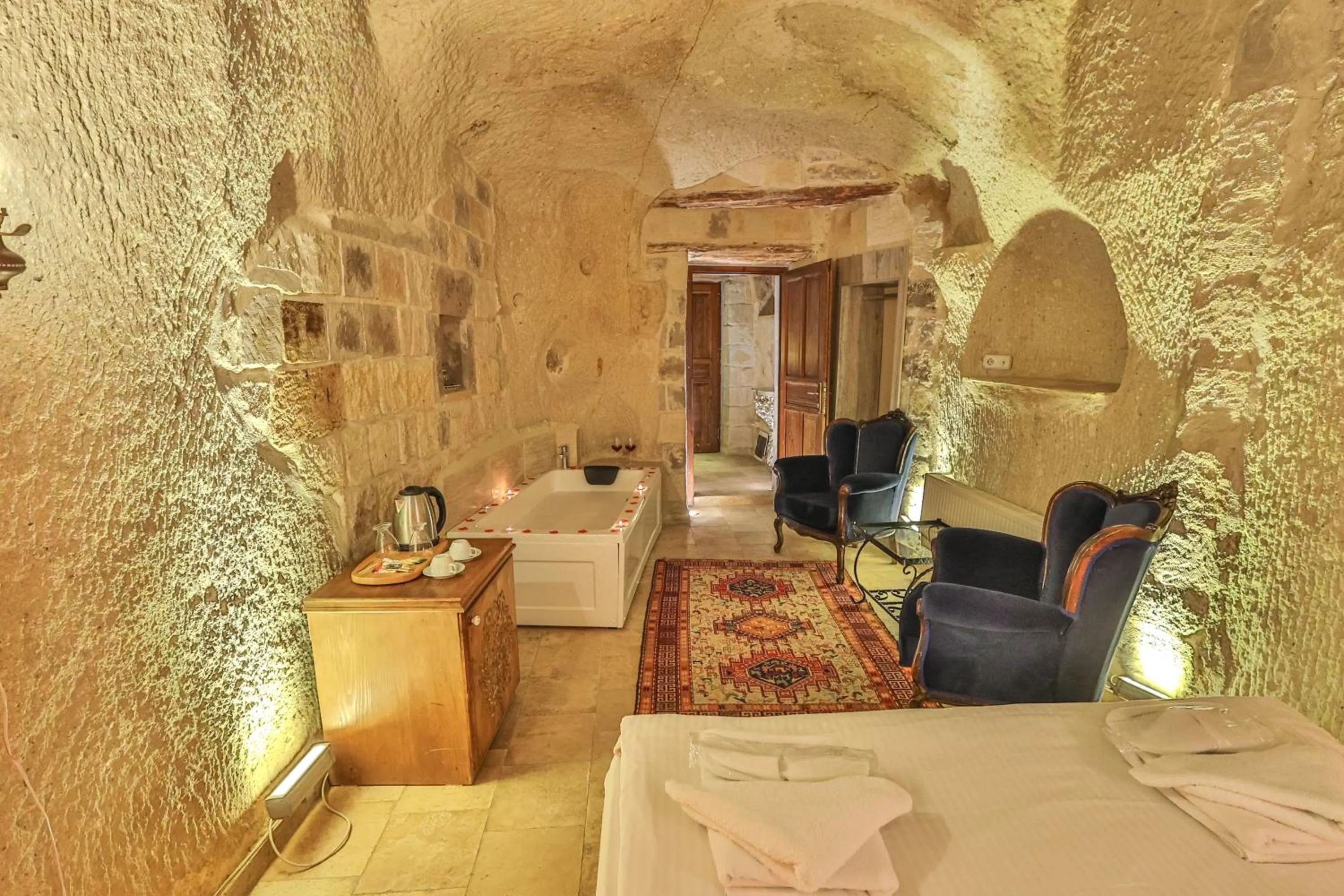 Bed in Bedrock Cave Hotel