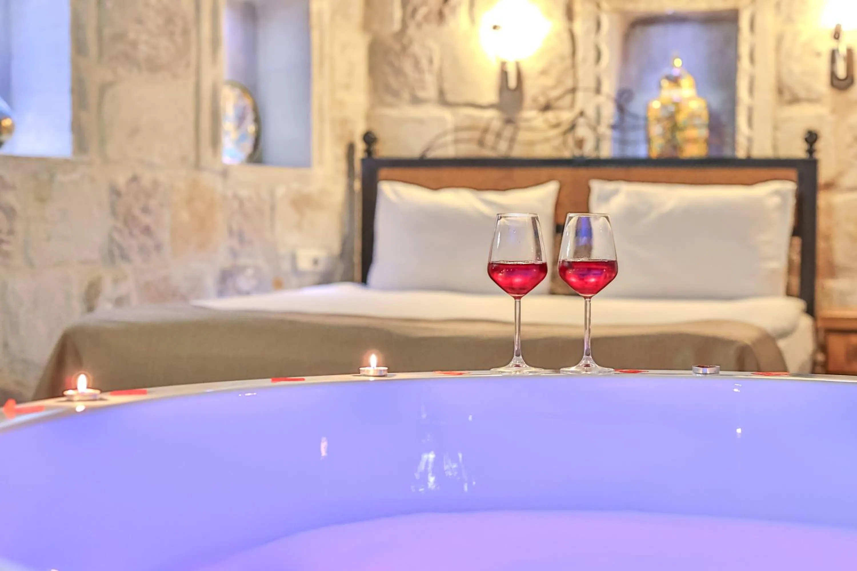 Bed in Bedrock Cave Hotel