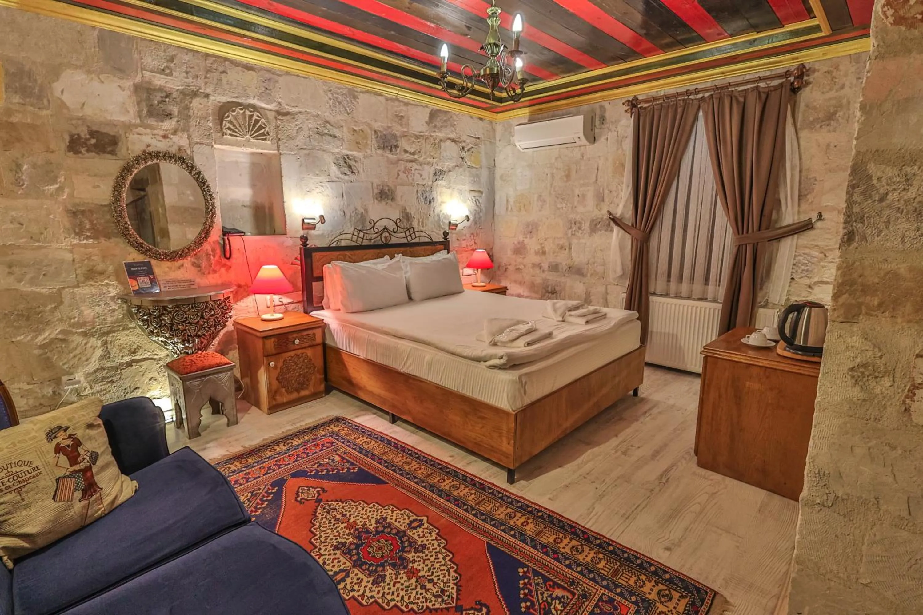 Bed in Bedrock Cave Hotel