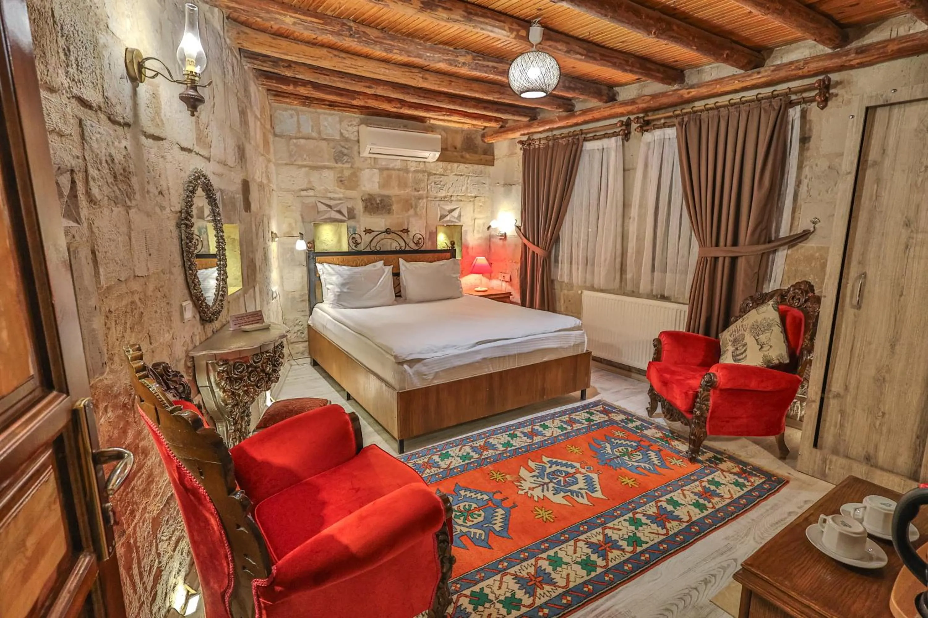 Bed in Bedrock Cave Hotel