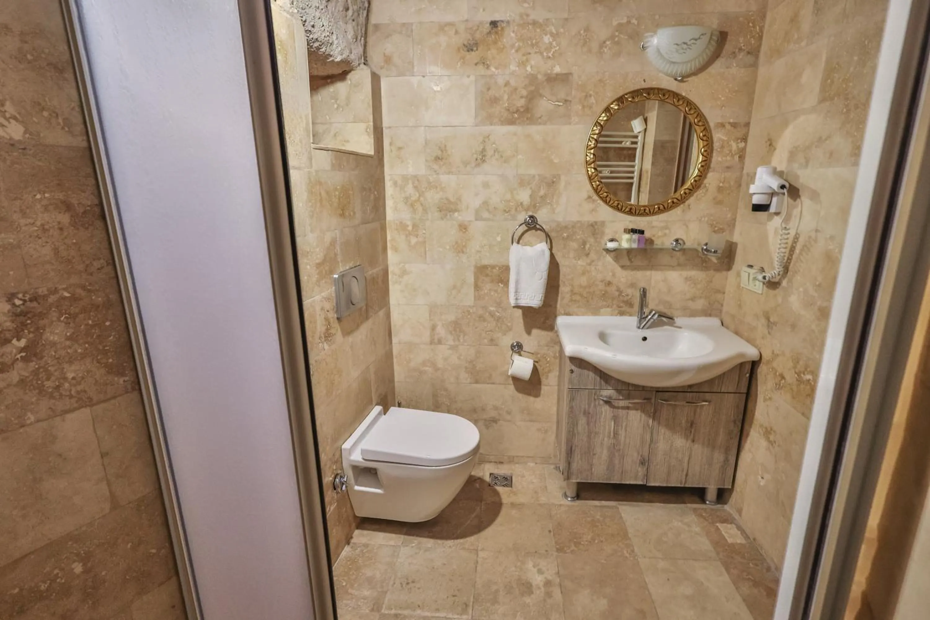 Shower in Bedrock Cave Hotel