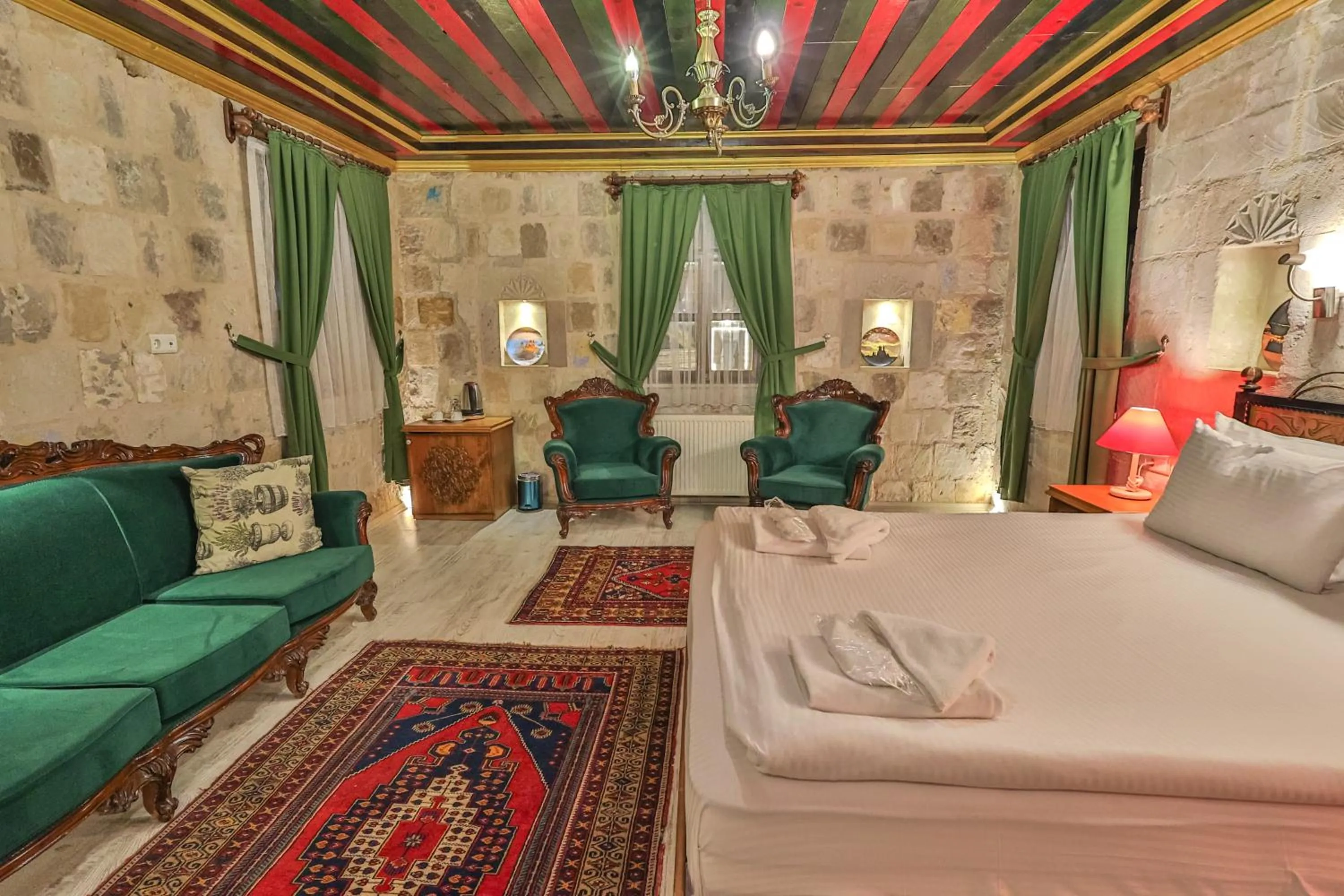 Bed in Bedrock Cave Hotel