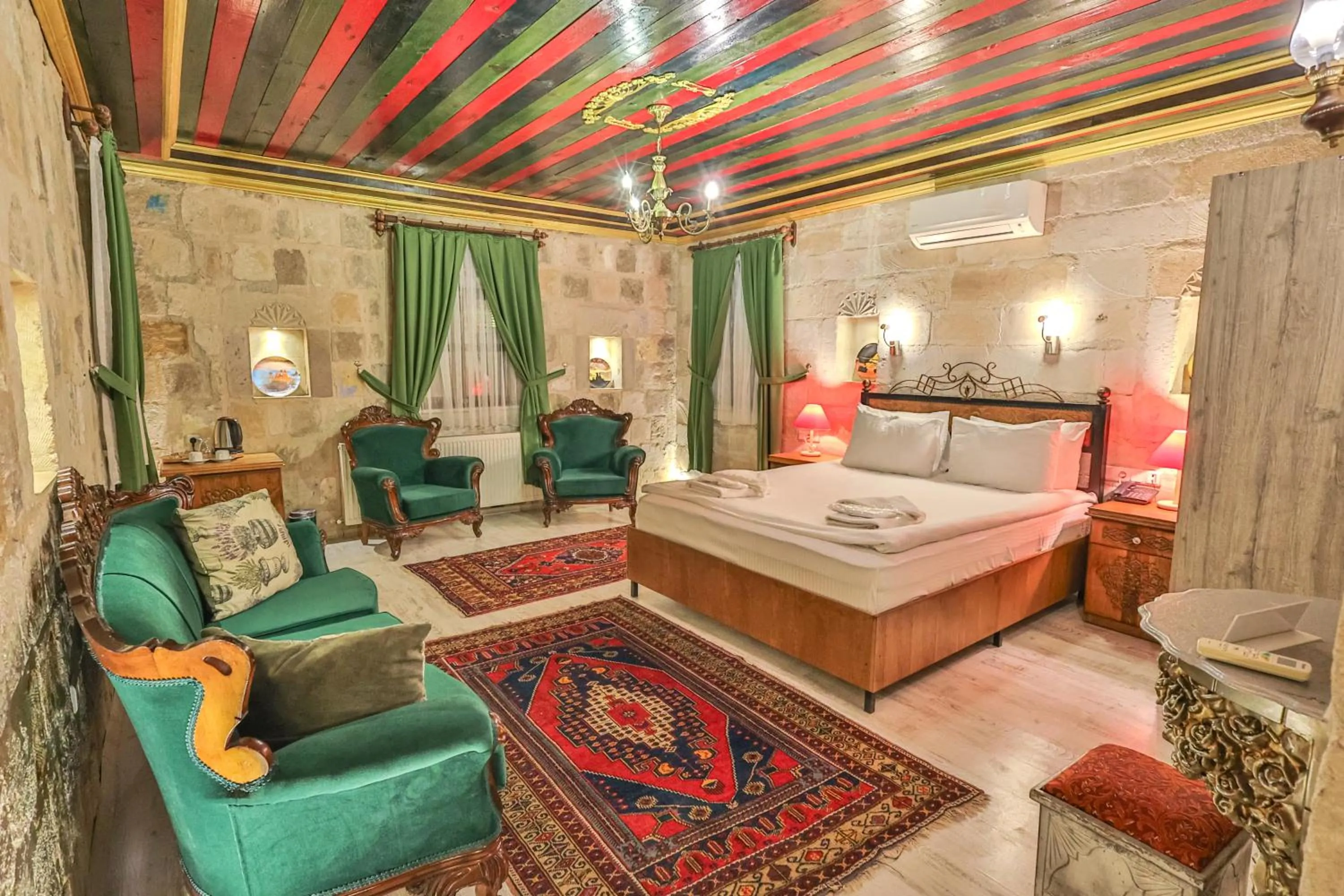 Bed in Bedrock Cave Hotel