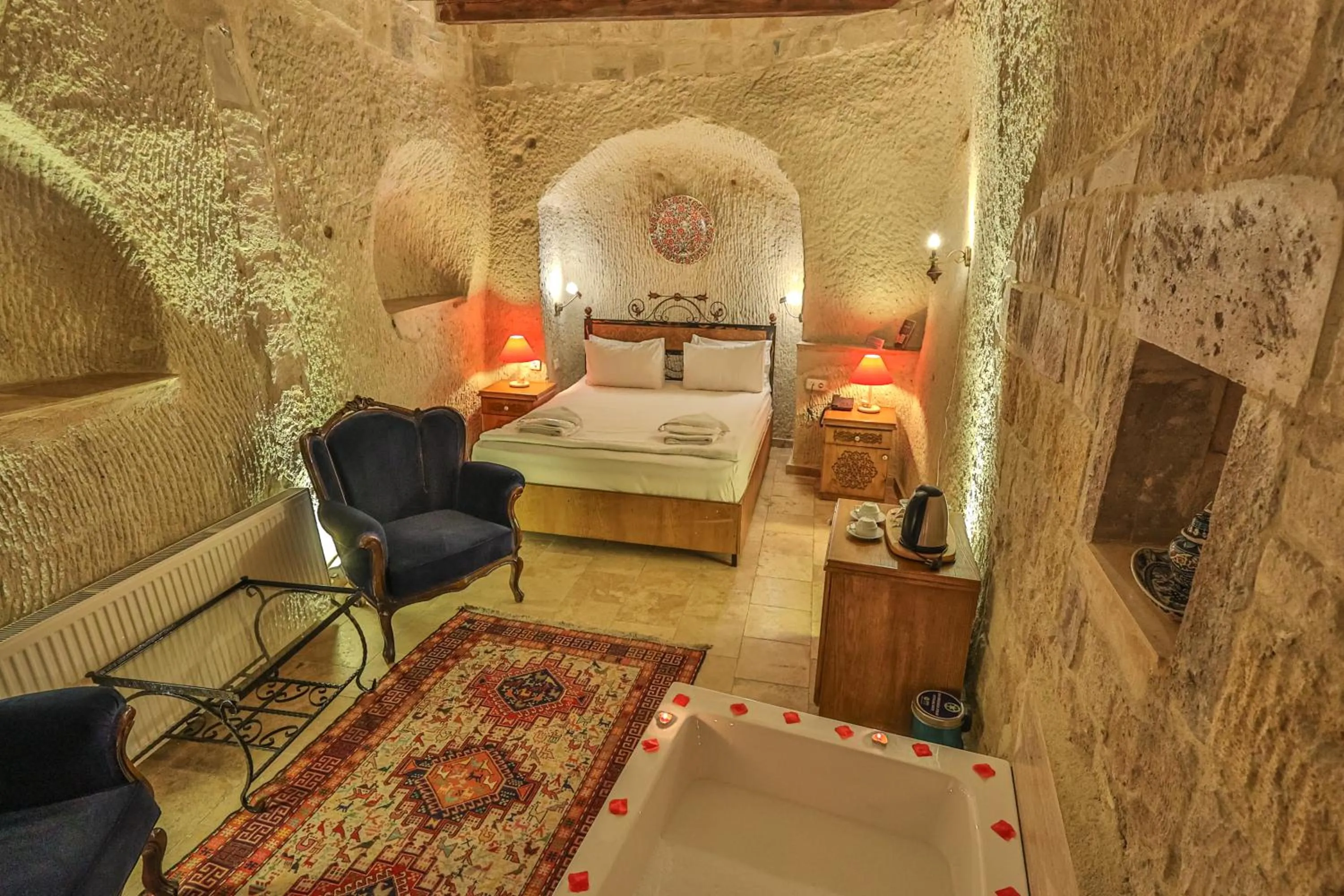 Bed in Bedrock Cave Hotel