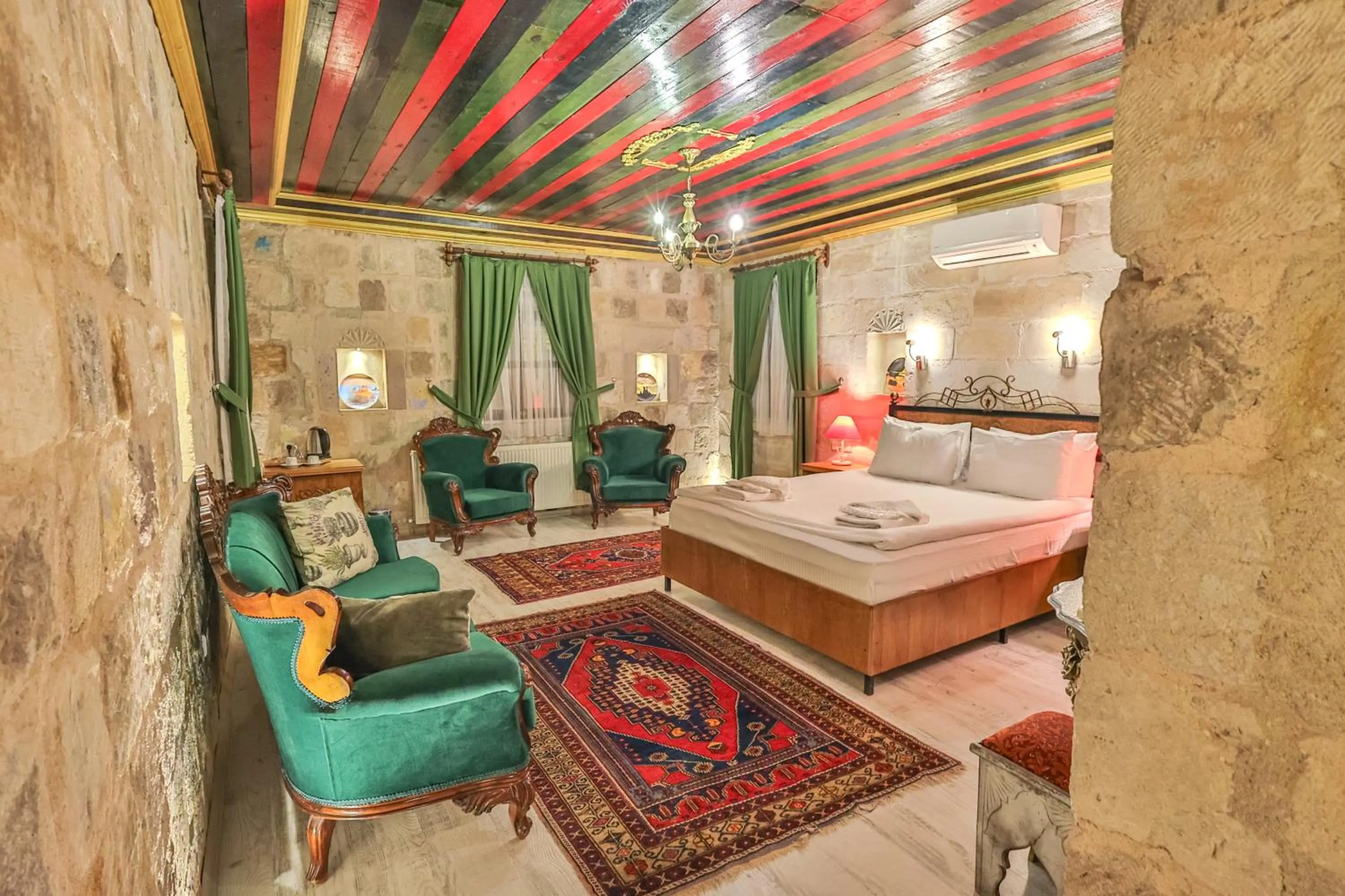 Bed in Bedrock Cave Hotel