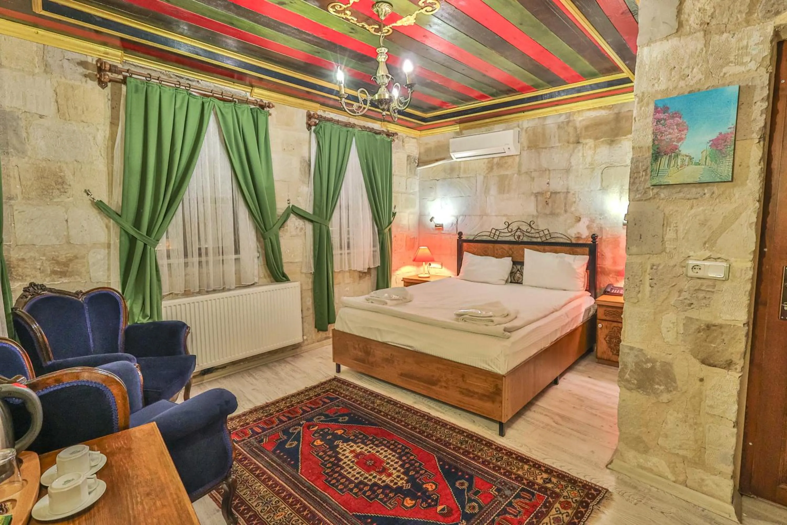 Bed in Bedrock Cave Hotel