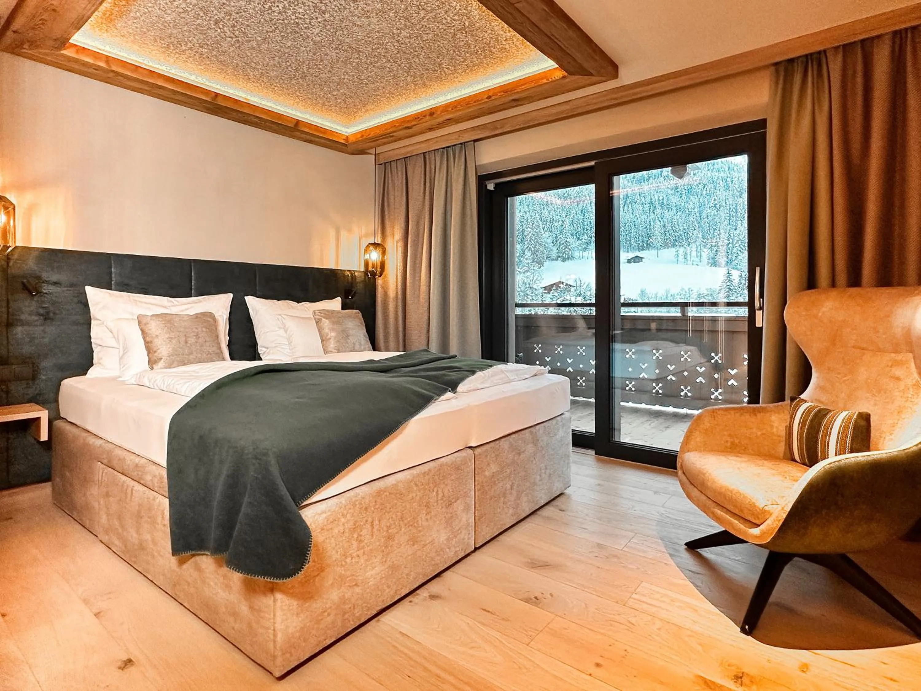 Photo of the whole room, Bed in Landhotel Alpenhof Filzmoos