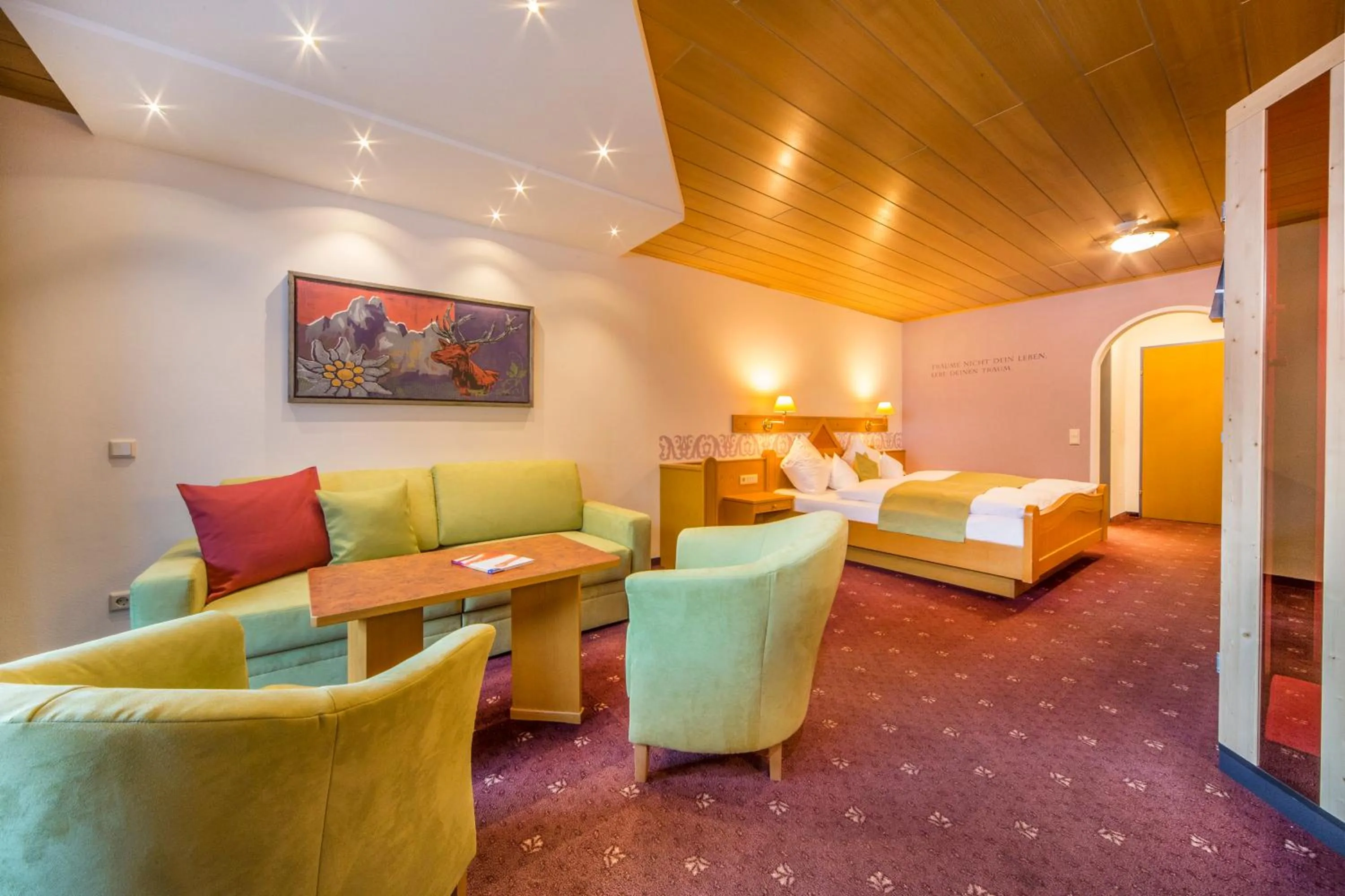 Photo of the whole room, Bed in Landhotel Alpenhof Filzmoos