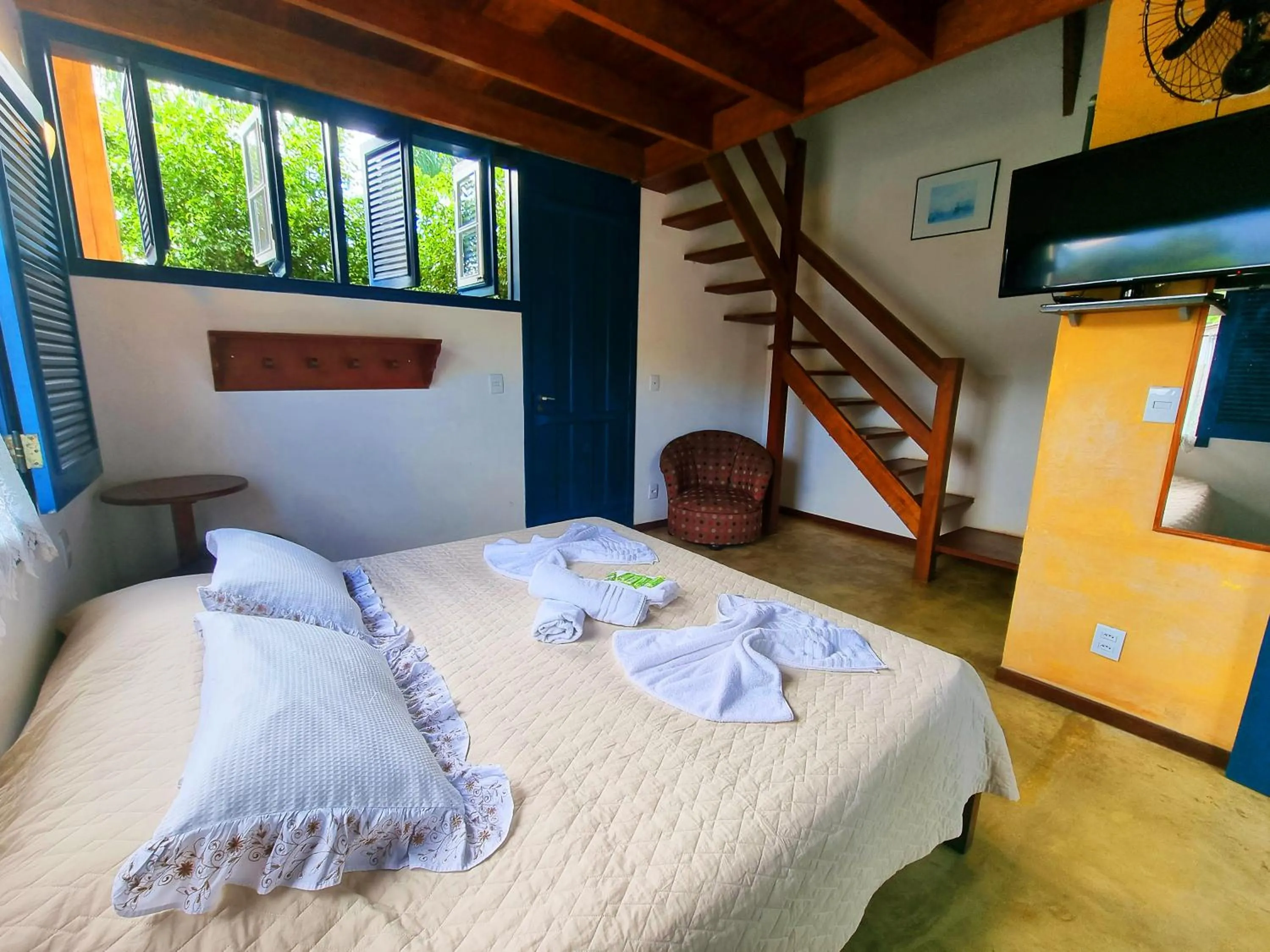 Bed in Pousada Rumo dos Ventos