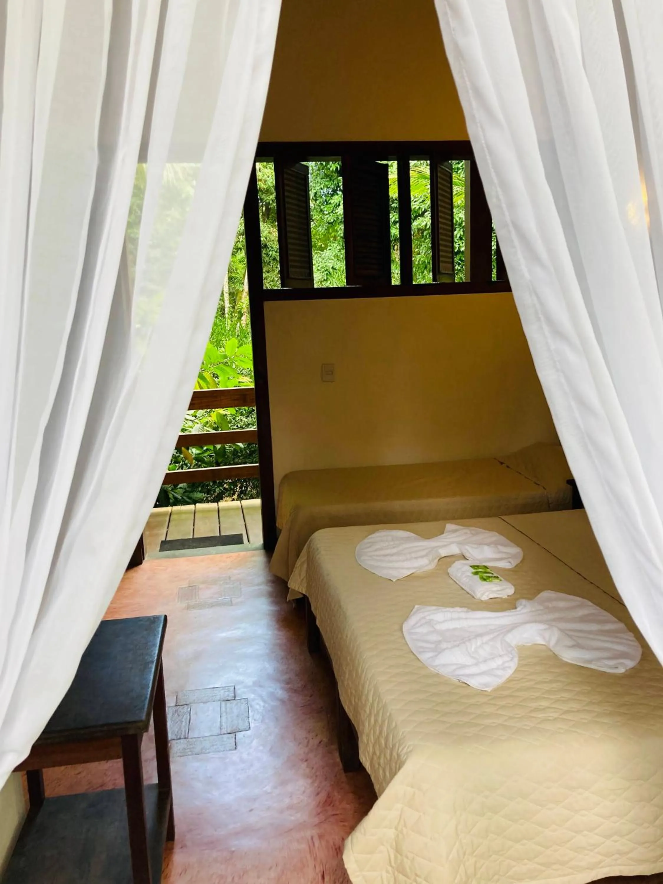 Bed in Pousada Rumo dos Ventos