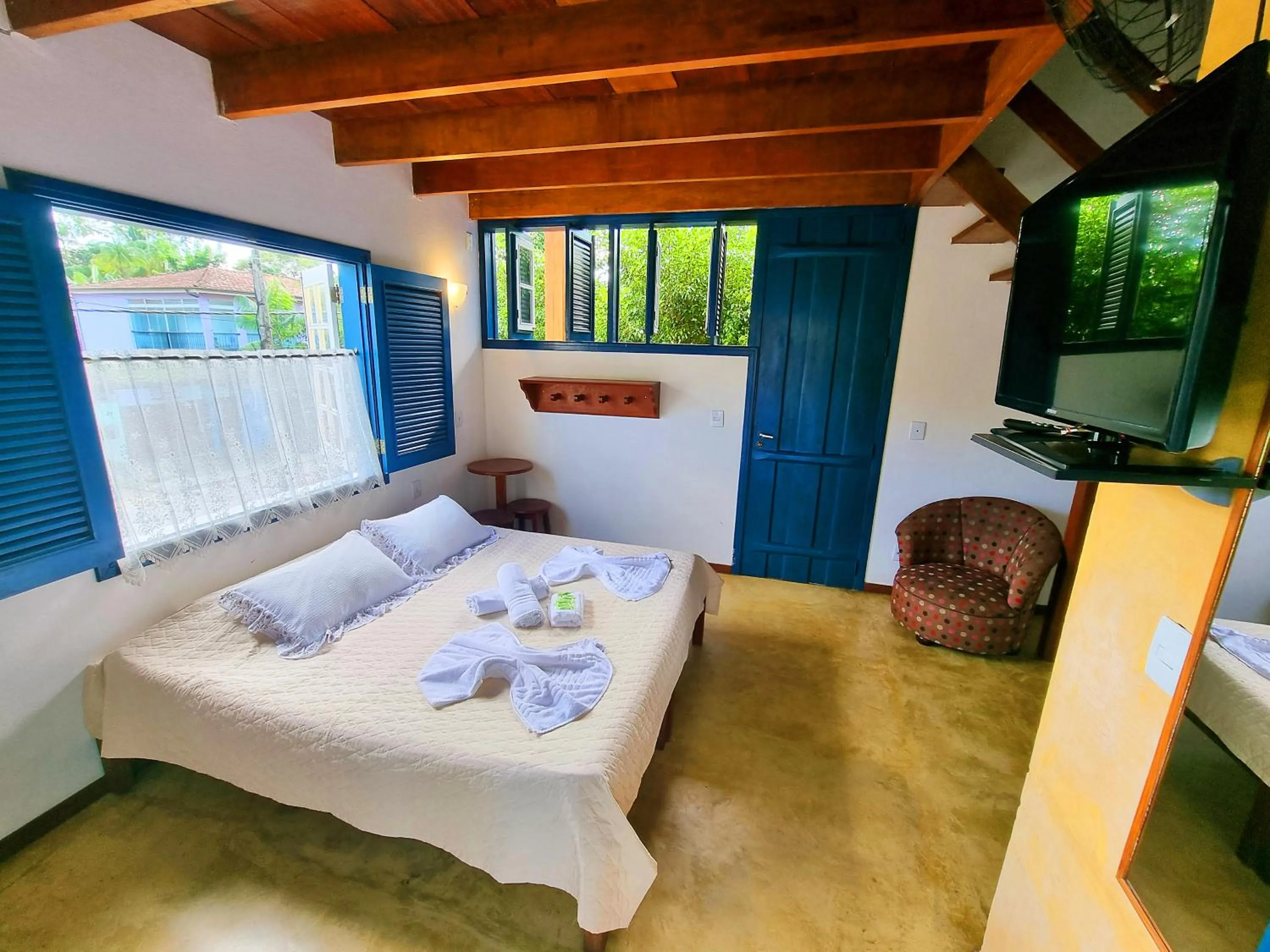 Photo of the whole room, Bed in Pousada Rumo dos Ventos