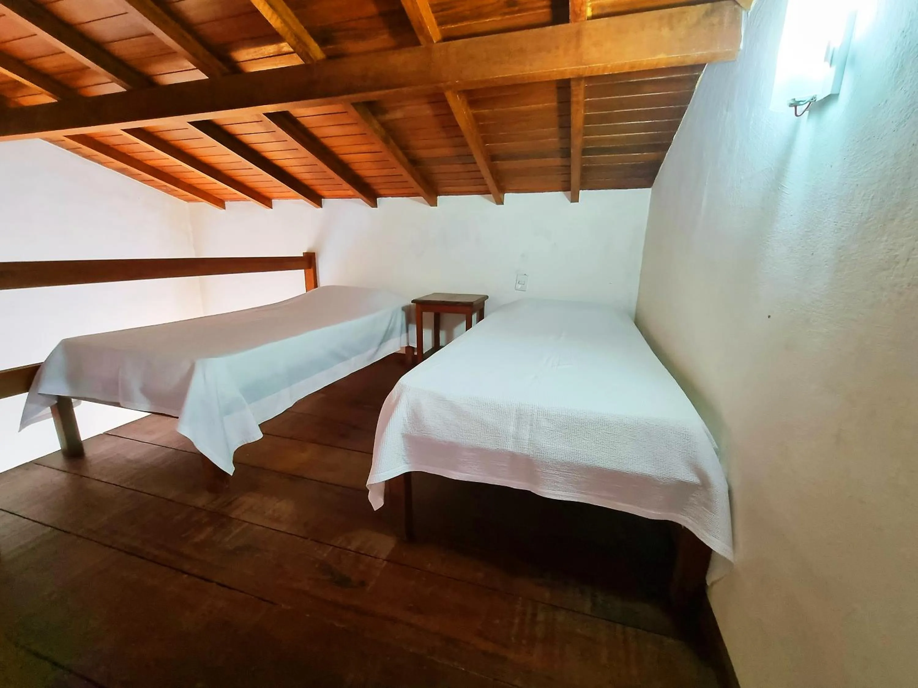 Bed in Pousada Rumo dos Ventos