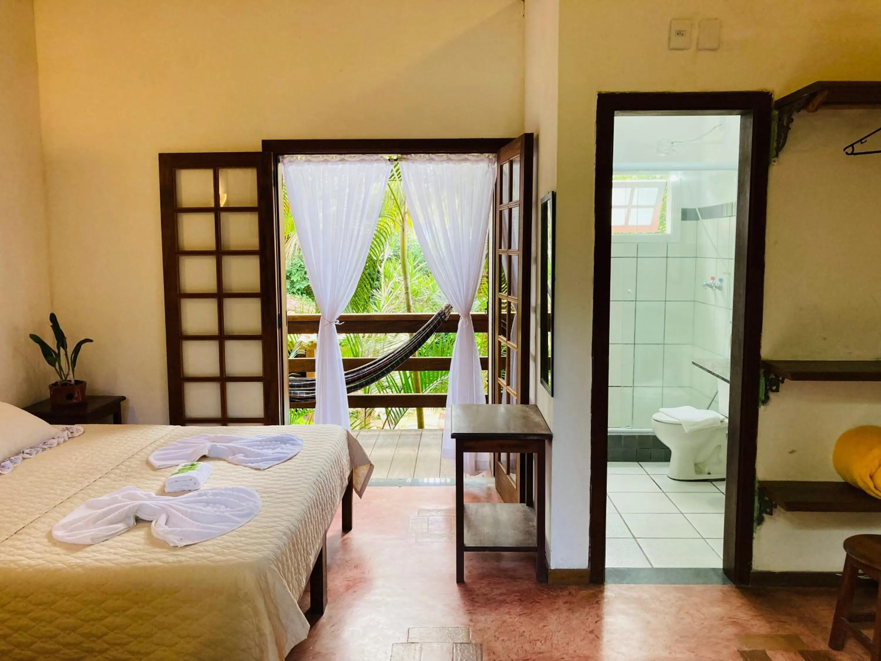 Balcony/Terrace, Bed in Pousada Rumo dos Ventos