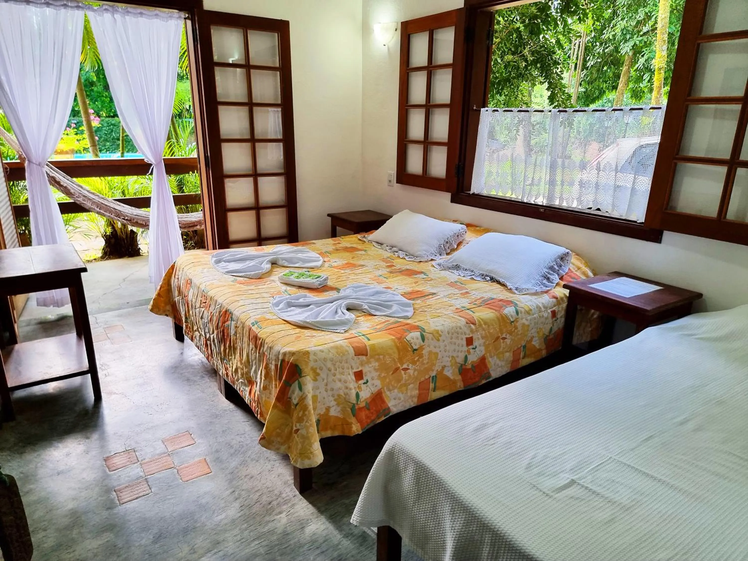 Bed in Pousada Rumo dos Ventos