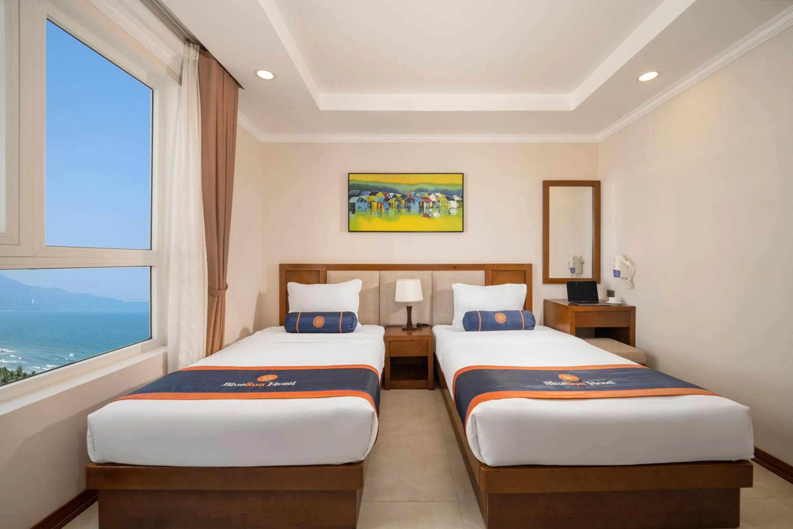 Deluxe Twin Room with Partial Sea View in BlueSun Danang Beach Hotel