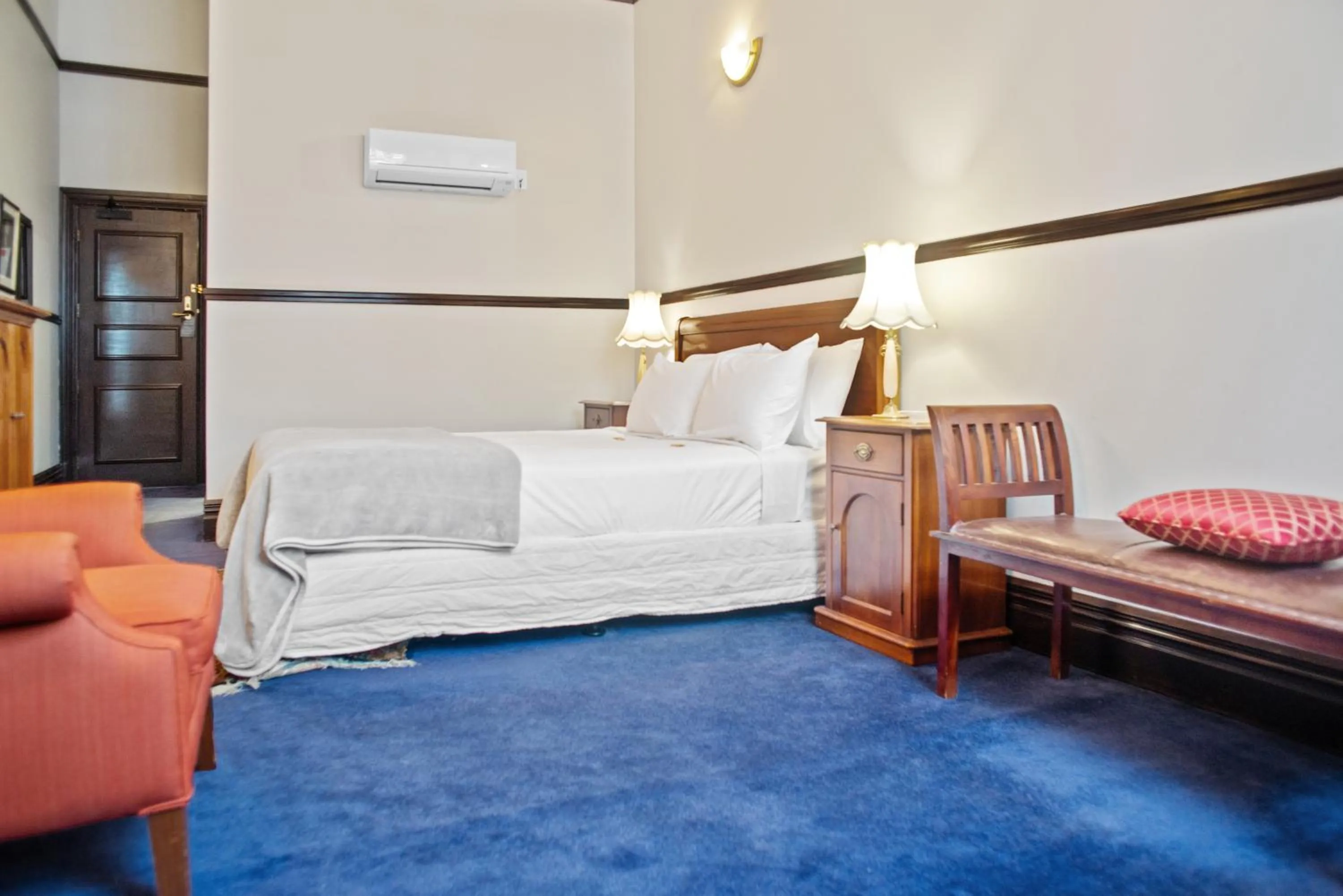 Bed in Wellesley Boutique Hotel