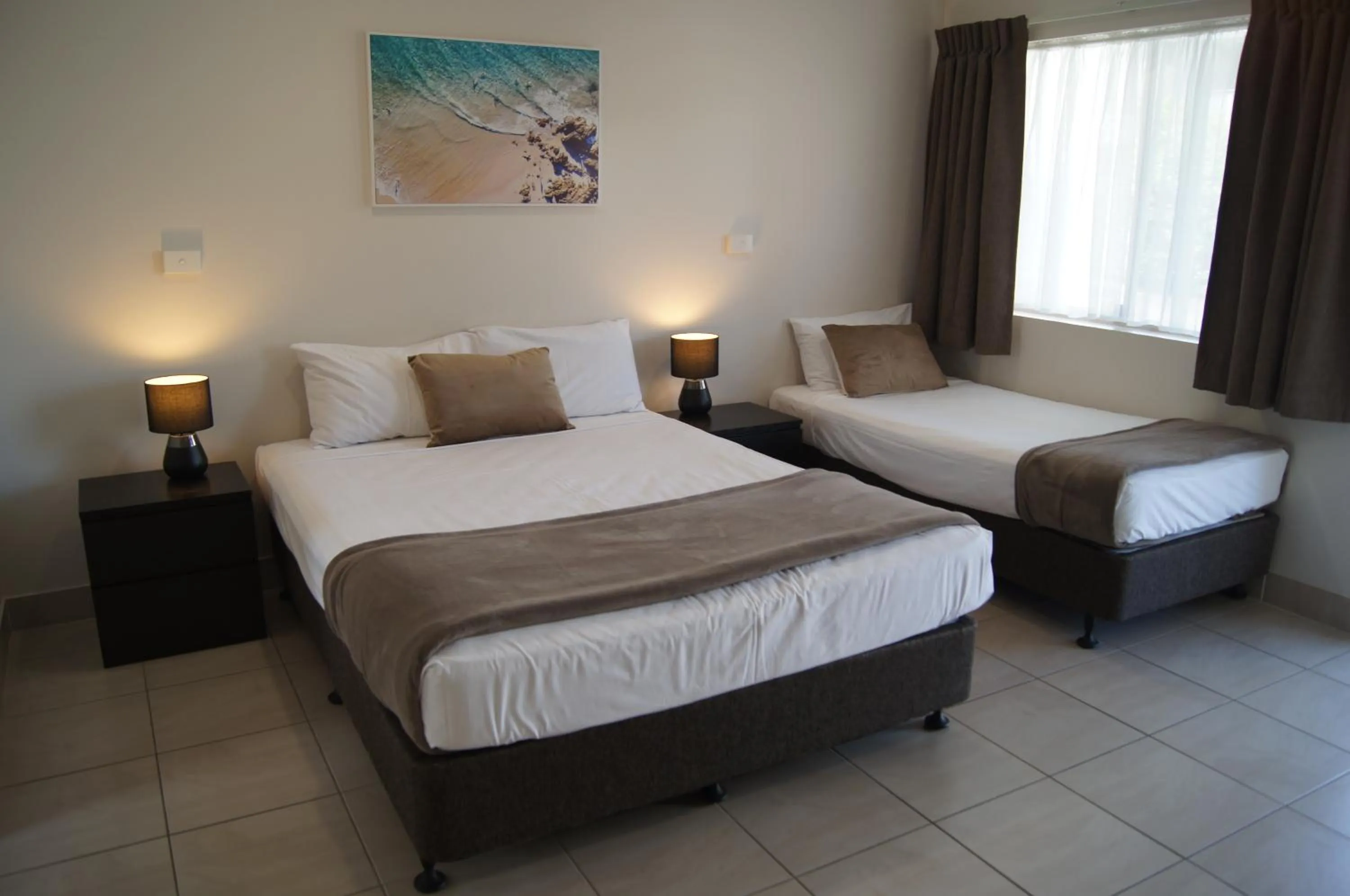 Bed in Beachside Motor Inn By Golden Chain