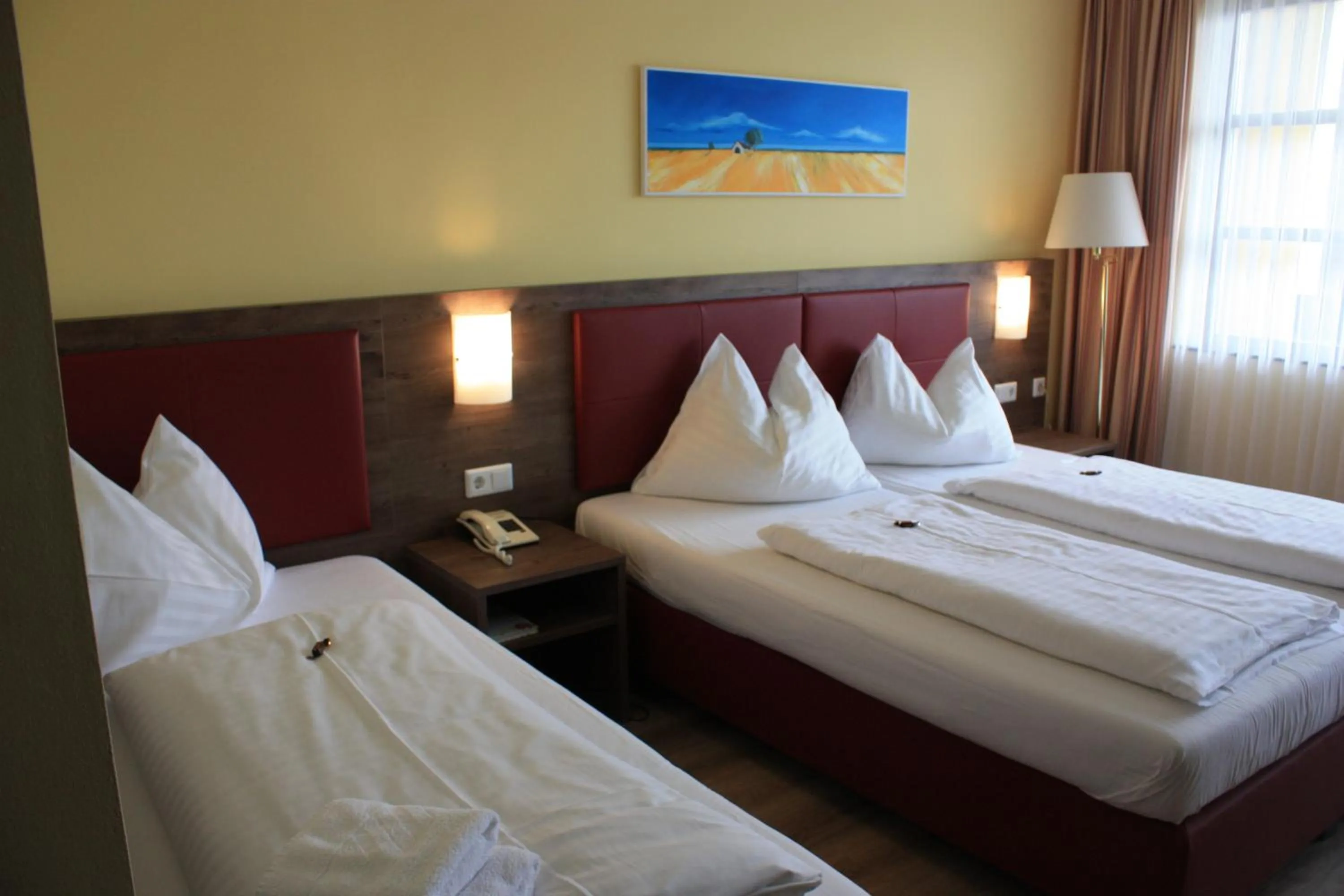 Photo of the whole room, Bed in Burgenländerhof Hotel Garni