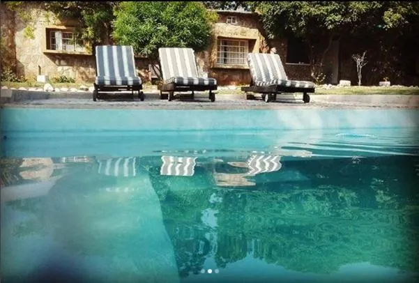 Swimming pool in Three Bridges B&B