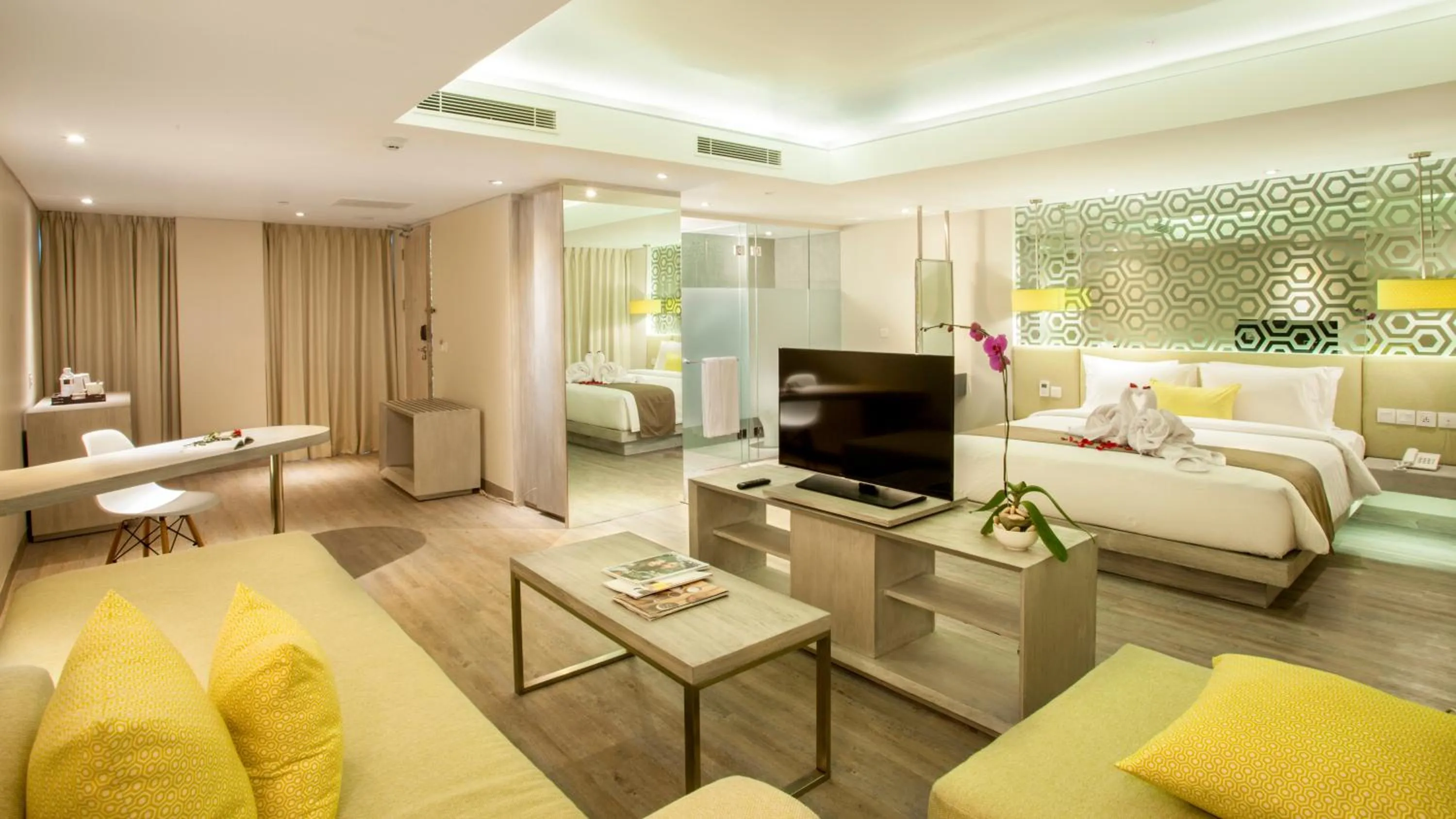 Living room, Bed in Hotel Daun Bali Seminyak