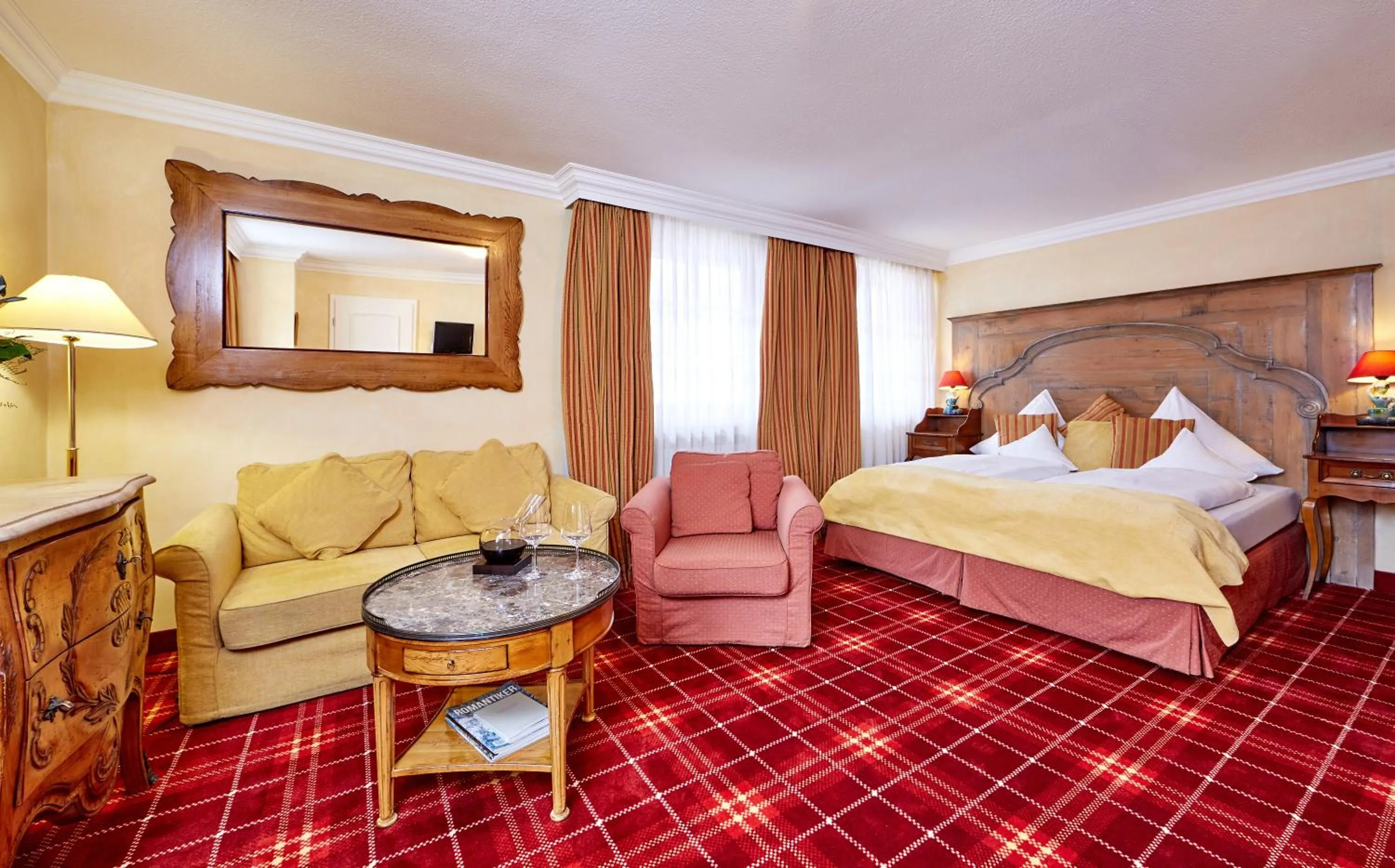 Photo of the whole room, Bed in Romantik Alpenhotel Waxenstein