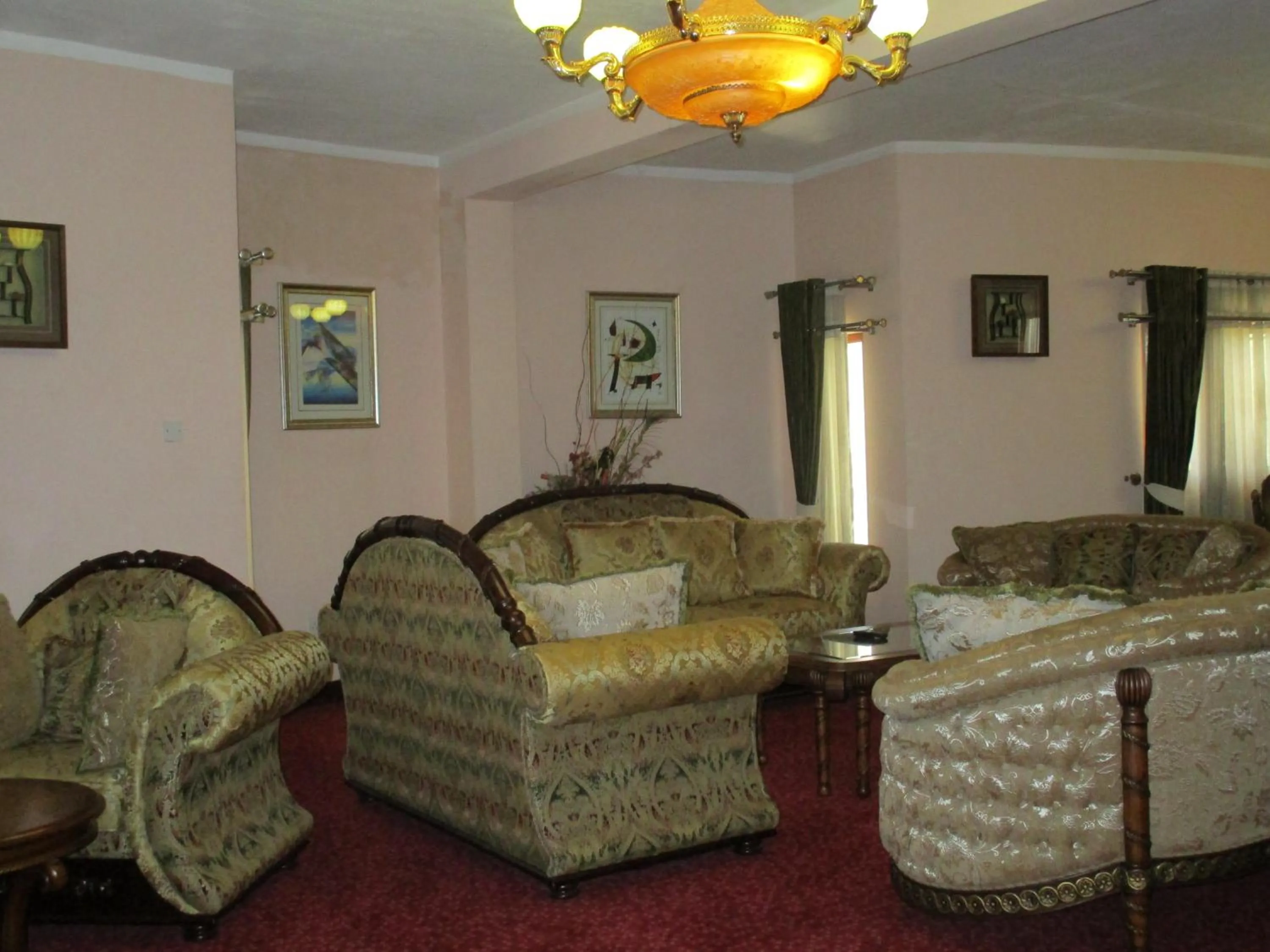 Communal lounge/ TV room in Imperial Royale Hotel