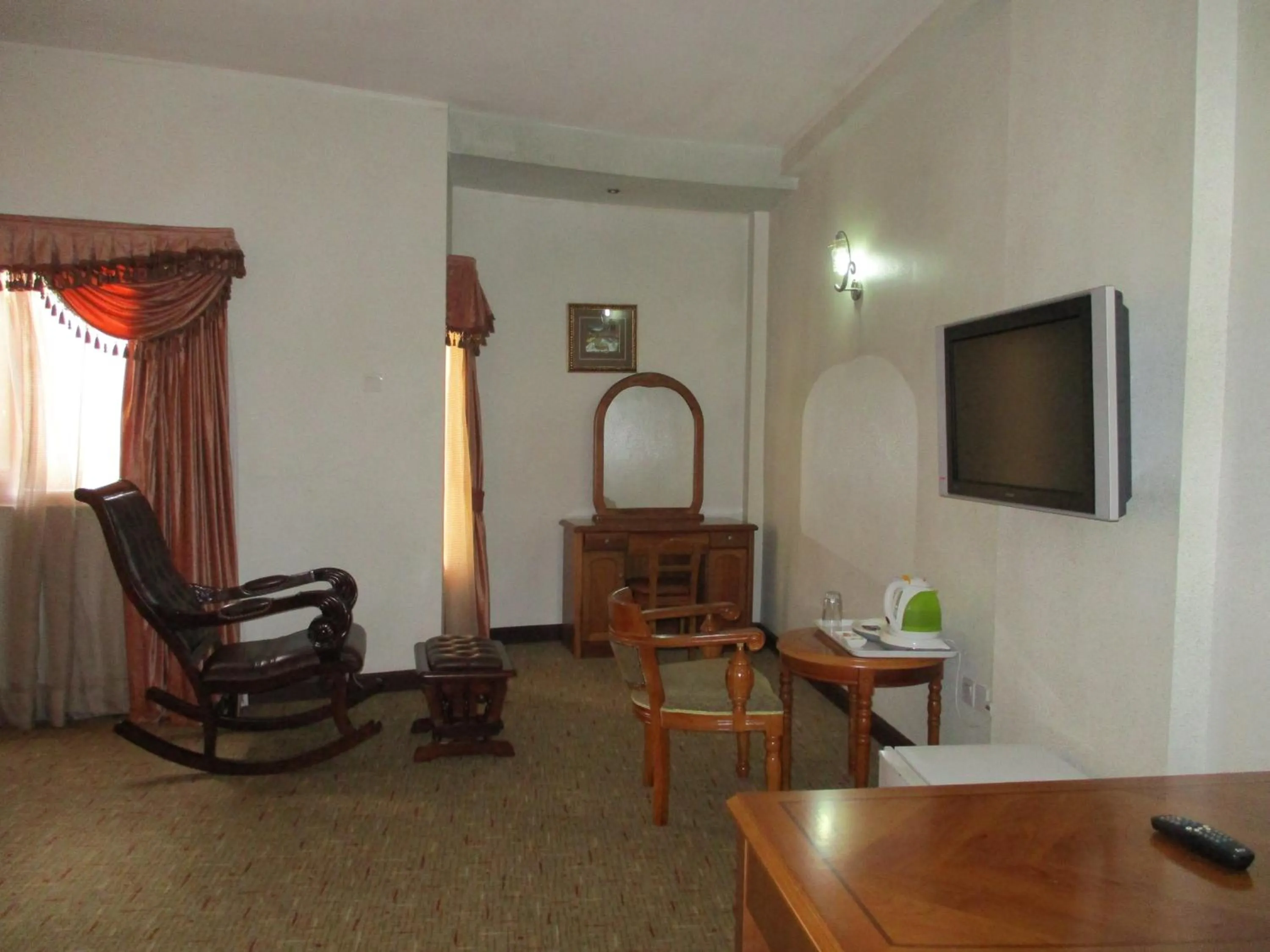 Communal lounge/ TV room in Imperial Royale Hotel