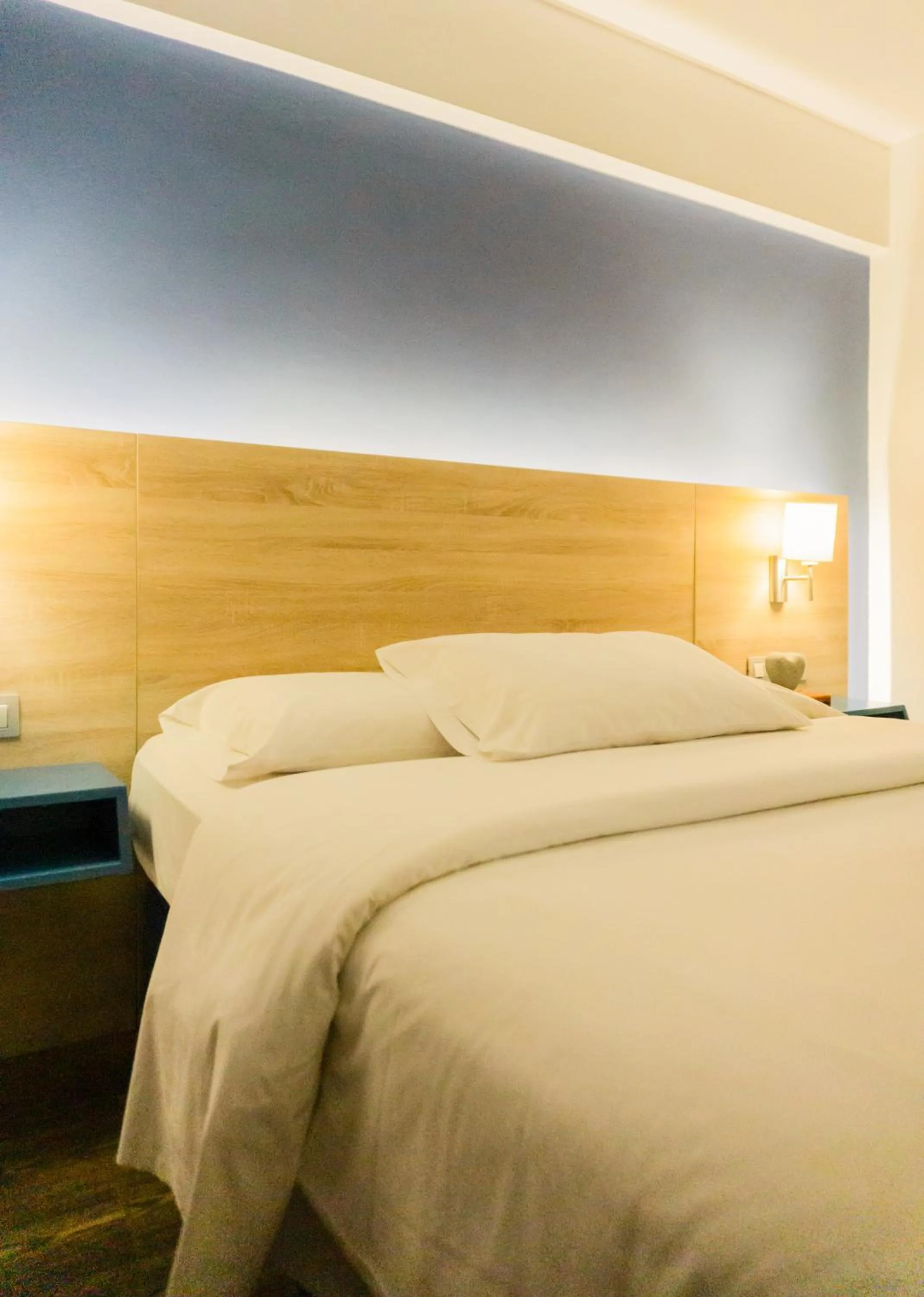 Bed in Daniel's Apart Hotel