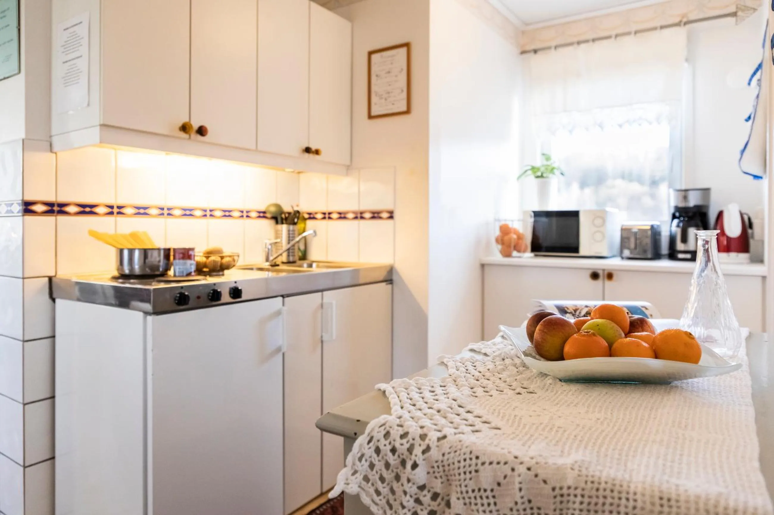 Kitchen or kitchenette in Skotteksgården Cottages