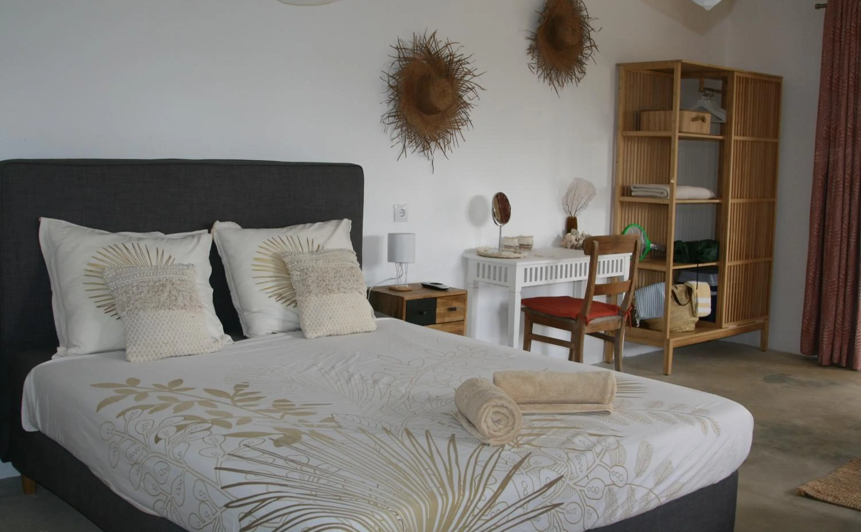 Bed in BnBBonaire near the ocean