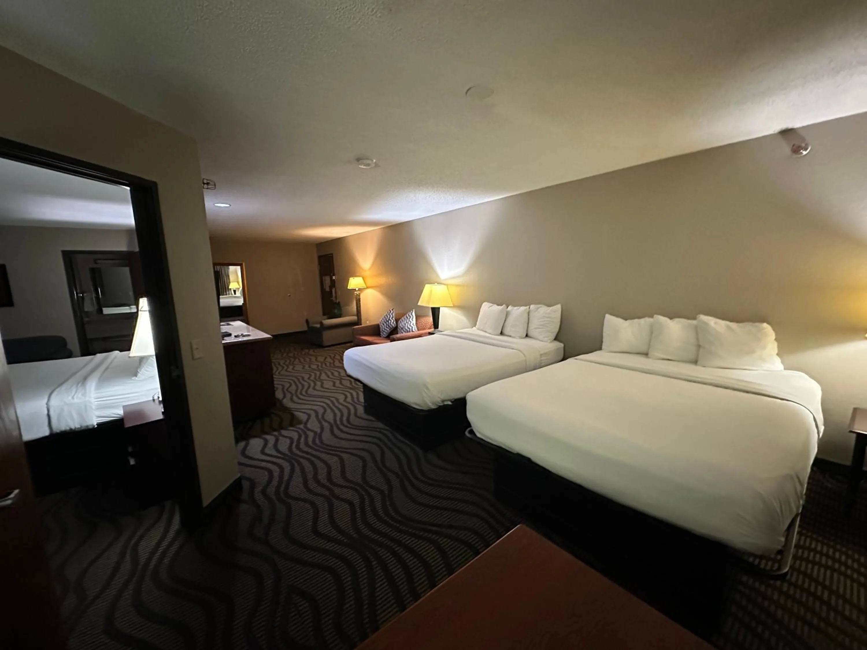 Bed in Baymont Inn & Suites by Wyndham Lincoln NE