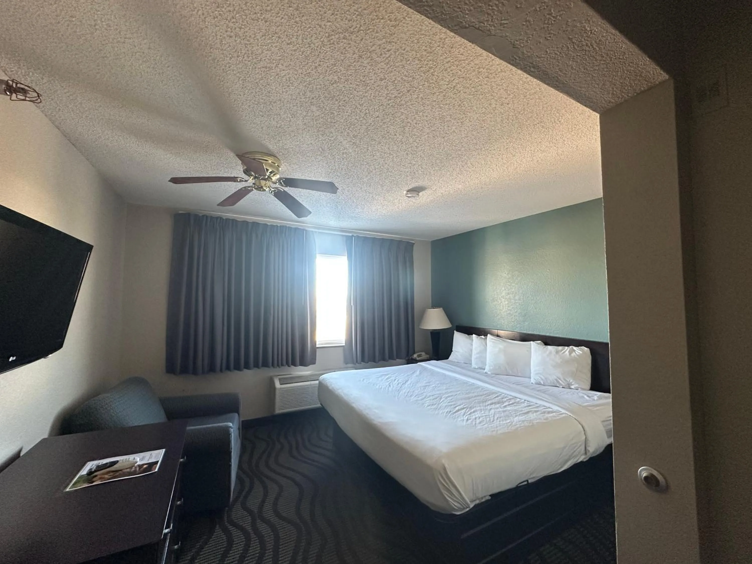 Bed in Baymont Inn & Suites by Wyndham Lincoln NE