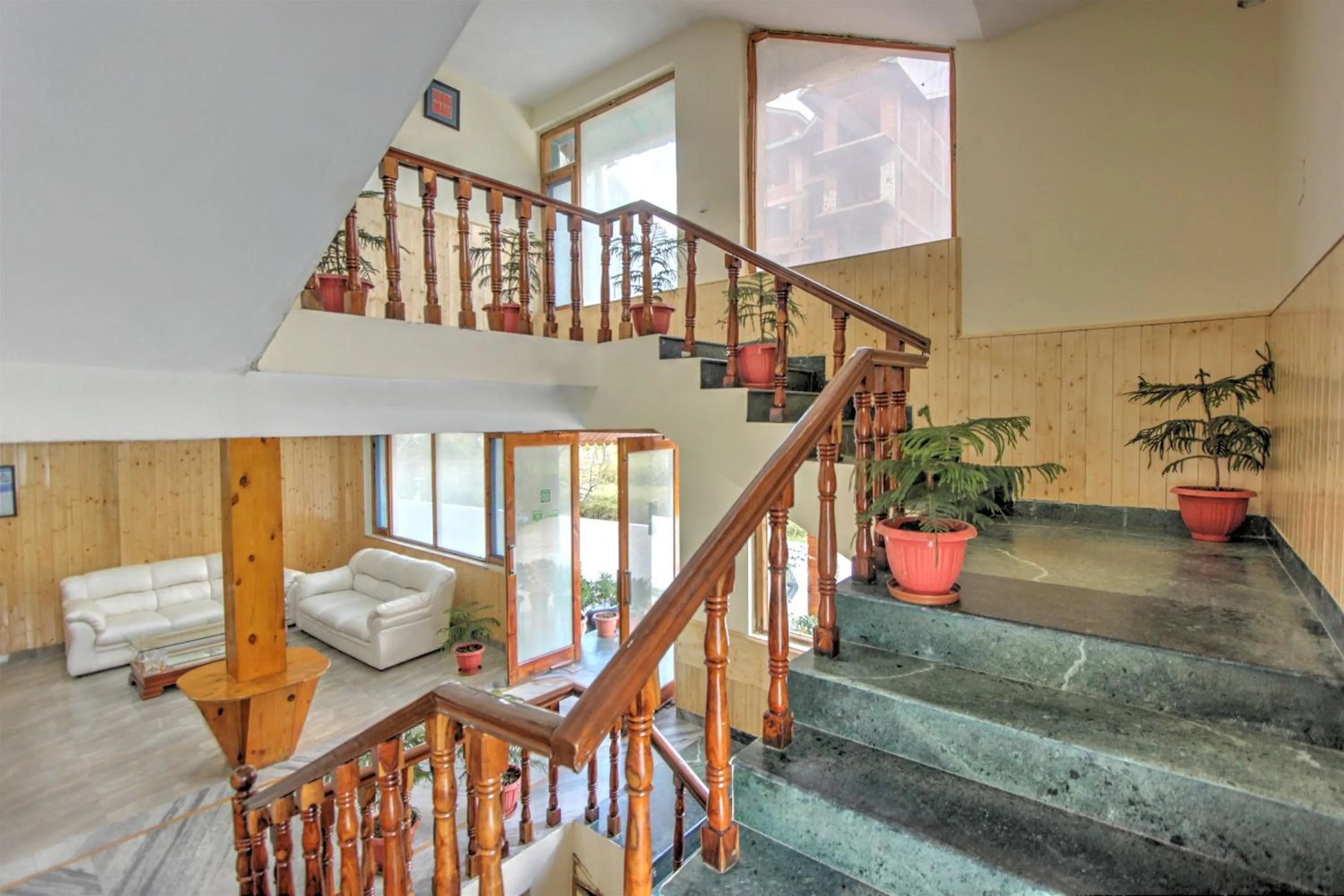 Living room in Hotel Mountain face by Snow City Hotels