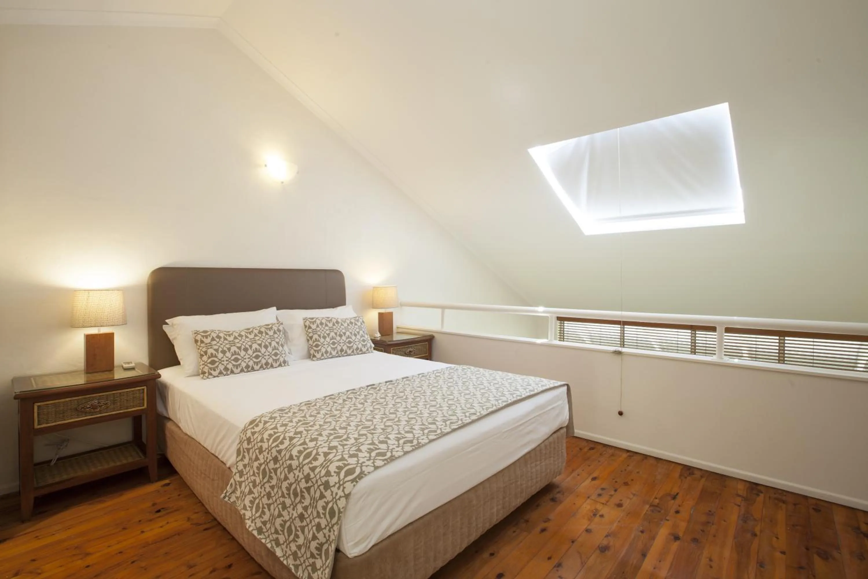 Bed in Coral Sea Villas