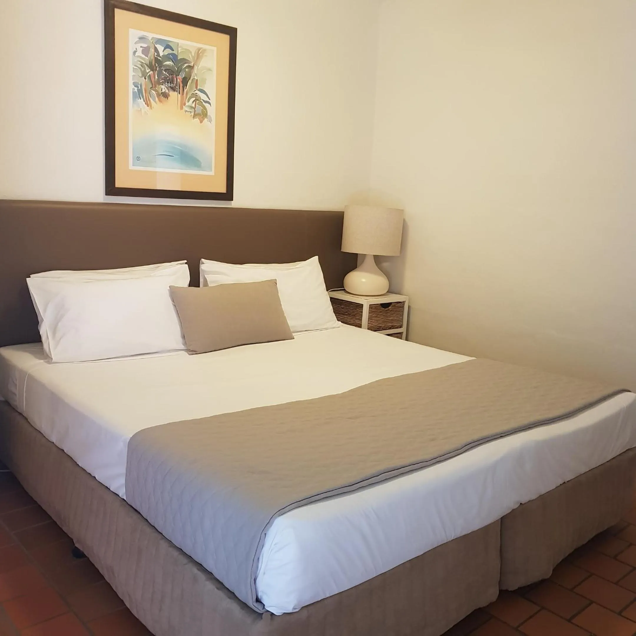 Bed in Coral Sea Villas