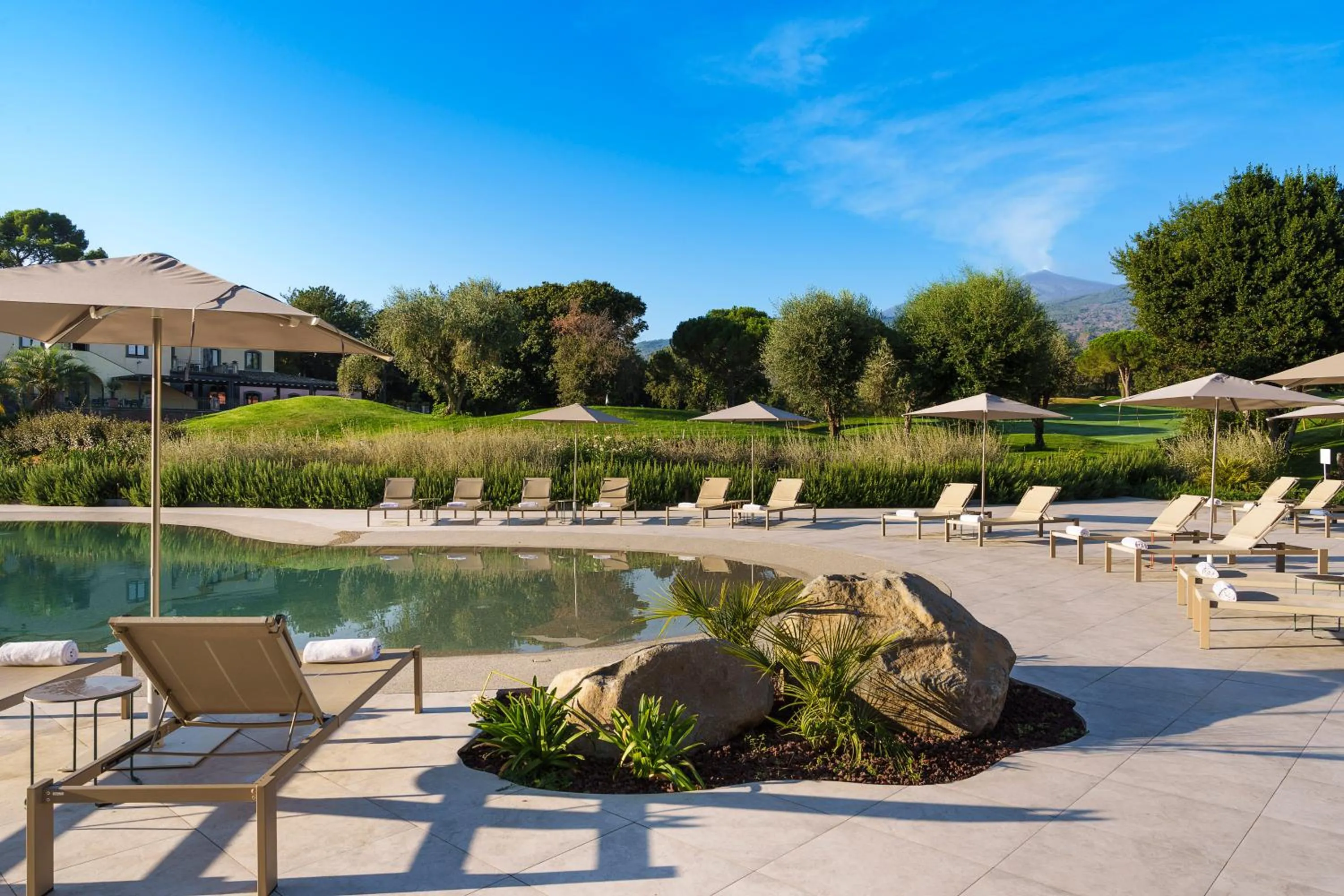 Swimming pool in Picciolo Etna Golf Resort & Spa, Curio Collection by Hilton