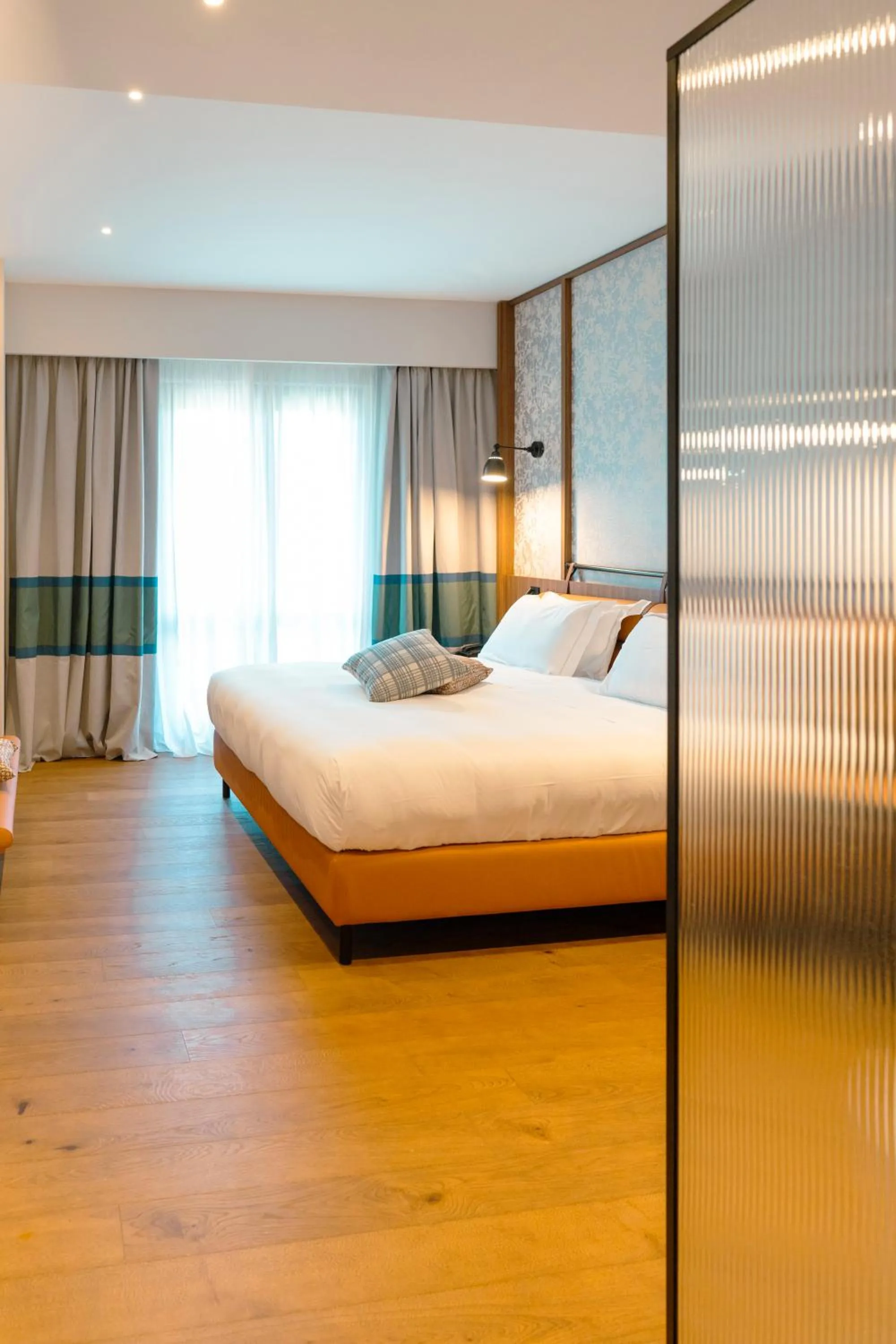 Bedroom, Bed in Picciolo Etna Golf Resort & Spa, Curio Collection by Hilton