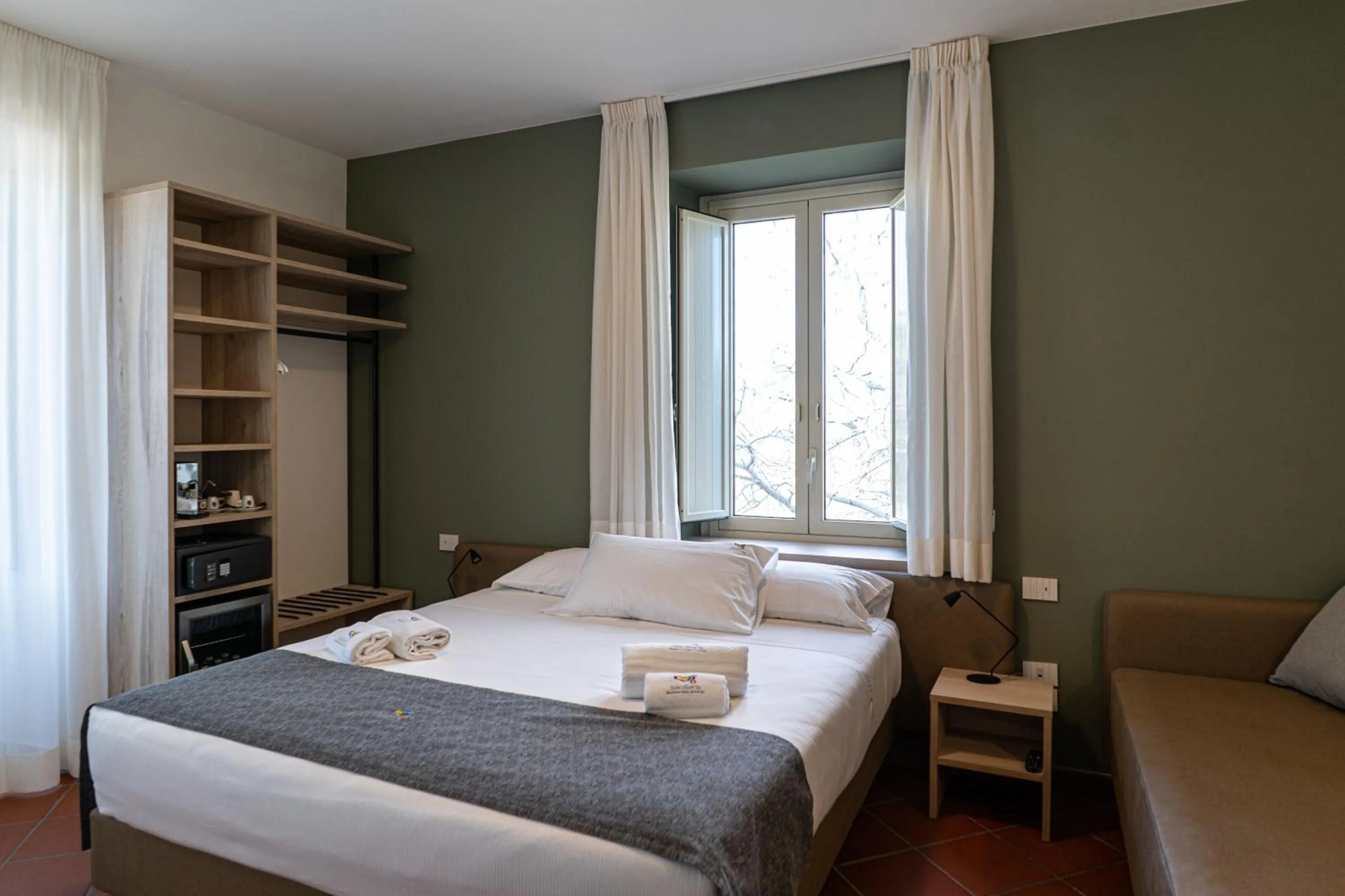 Bed in Picciolo Etna Golf Resort & Spa, Curio Collection by Hilton